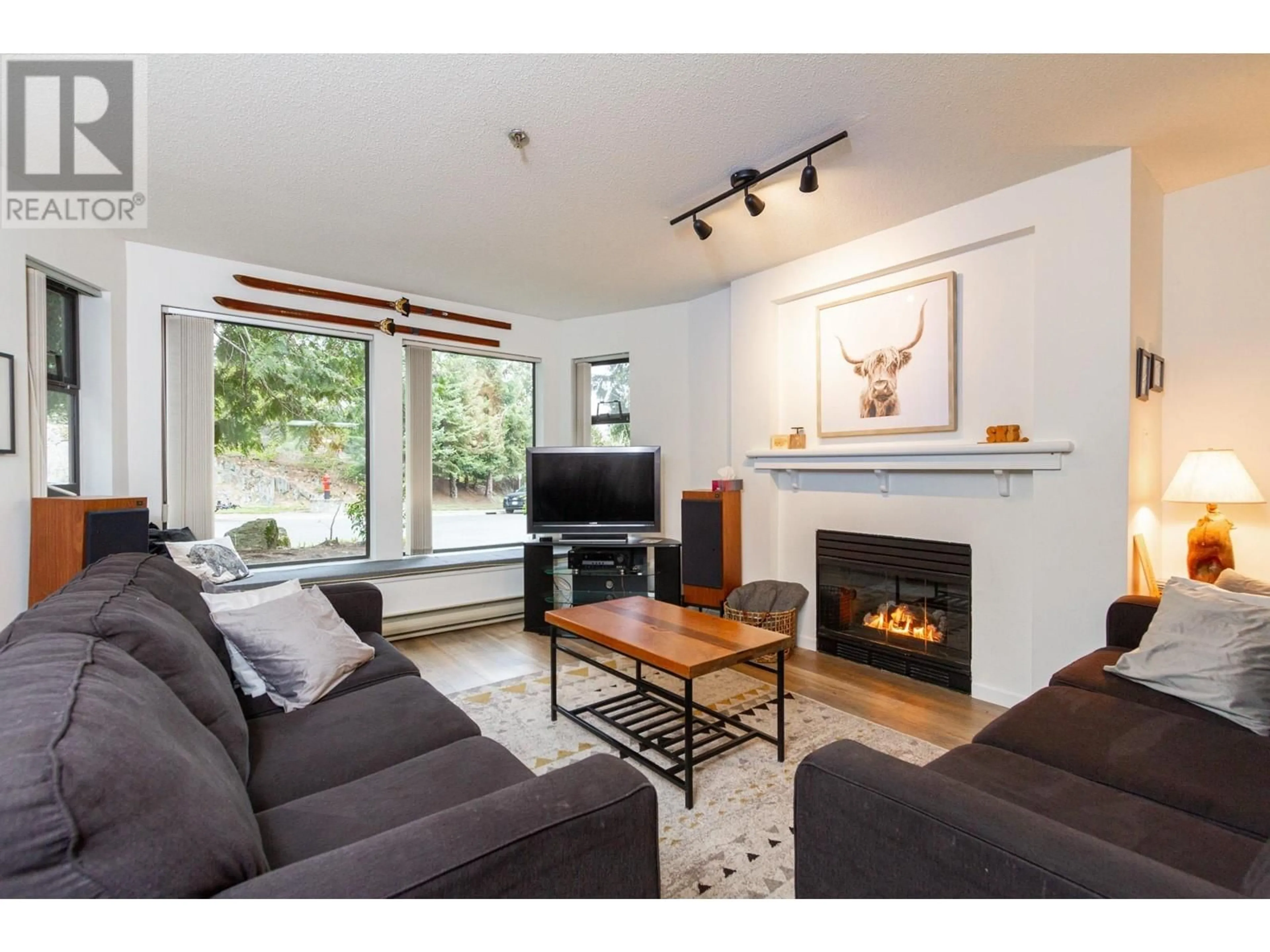 Living room, wood floors for 122 3309 PTARMIGAN PLACE, Whistler British Columbia V8E0V6