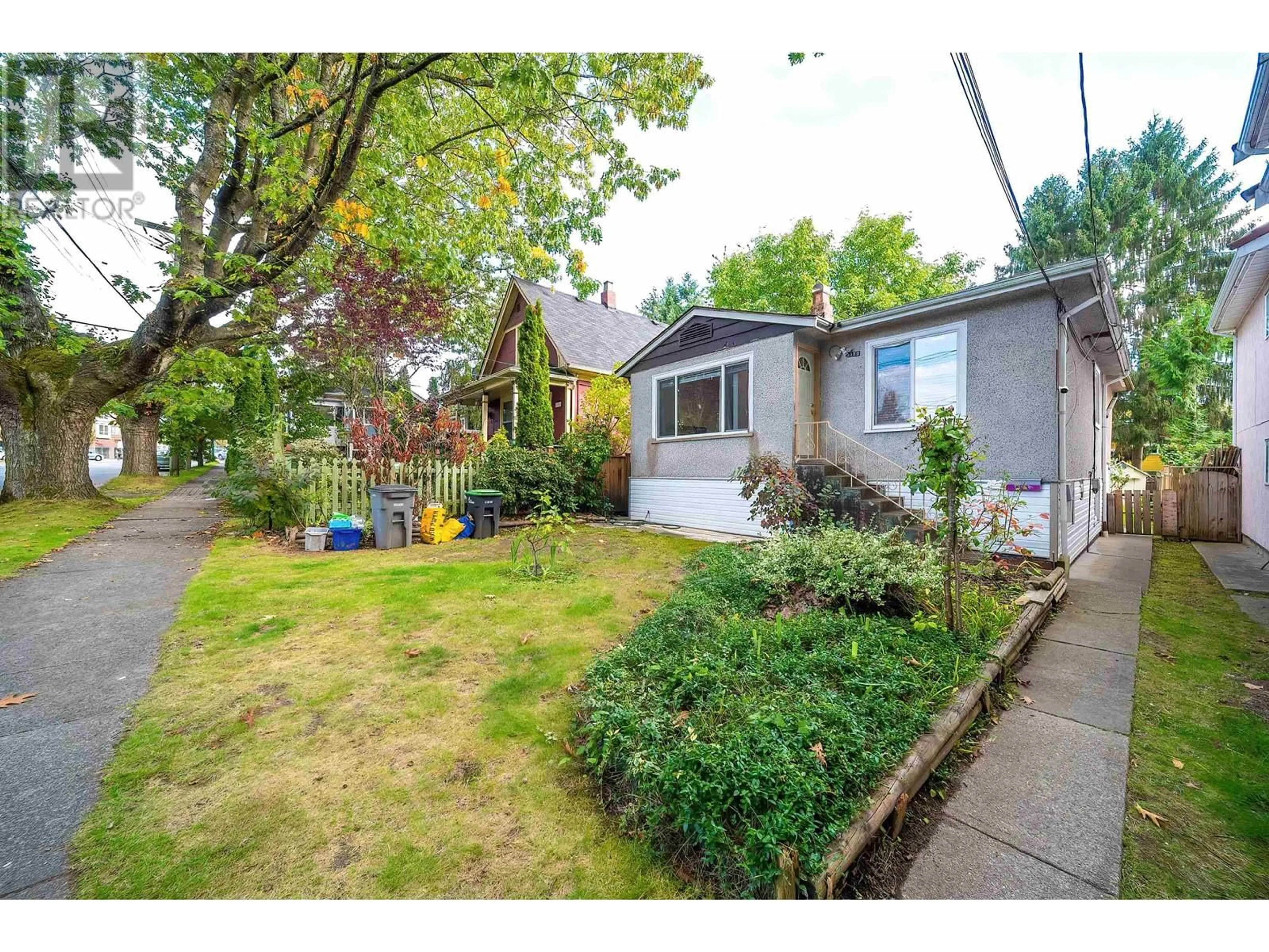 Frontside or backside of a home, the fenced backyard for 1150 E 21ST AVENUE, Vancouver British Columbia V5V1S8