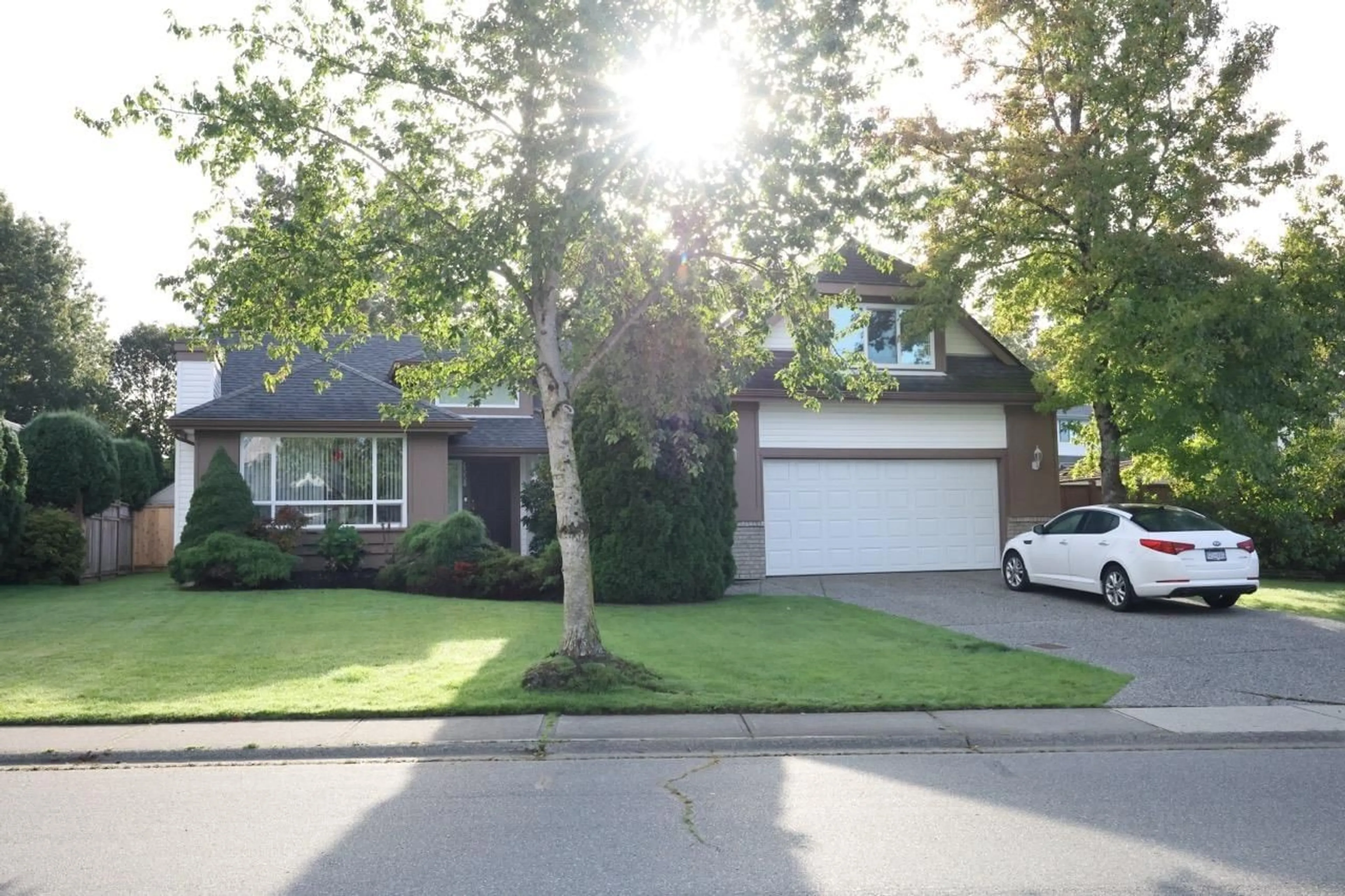 Frontside or backside of a home, the street view for 4558 220 STREET, Langley British Columbia V3A8E2