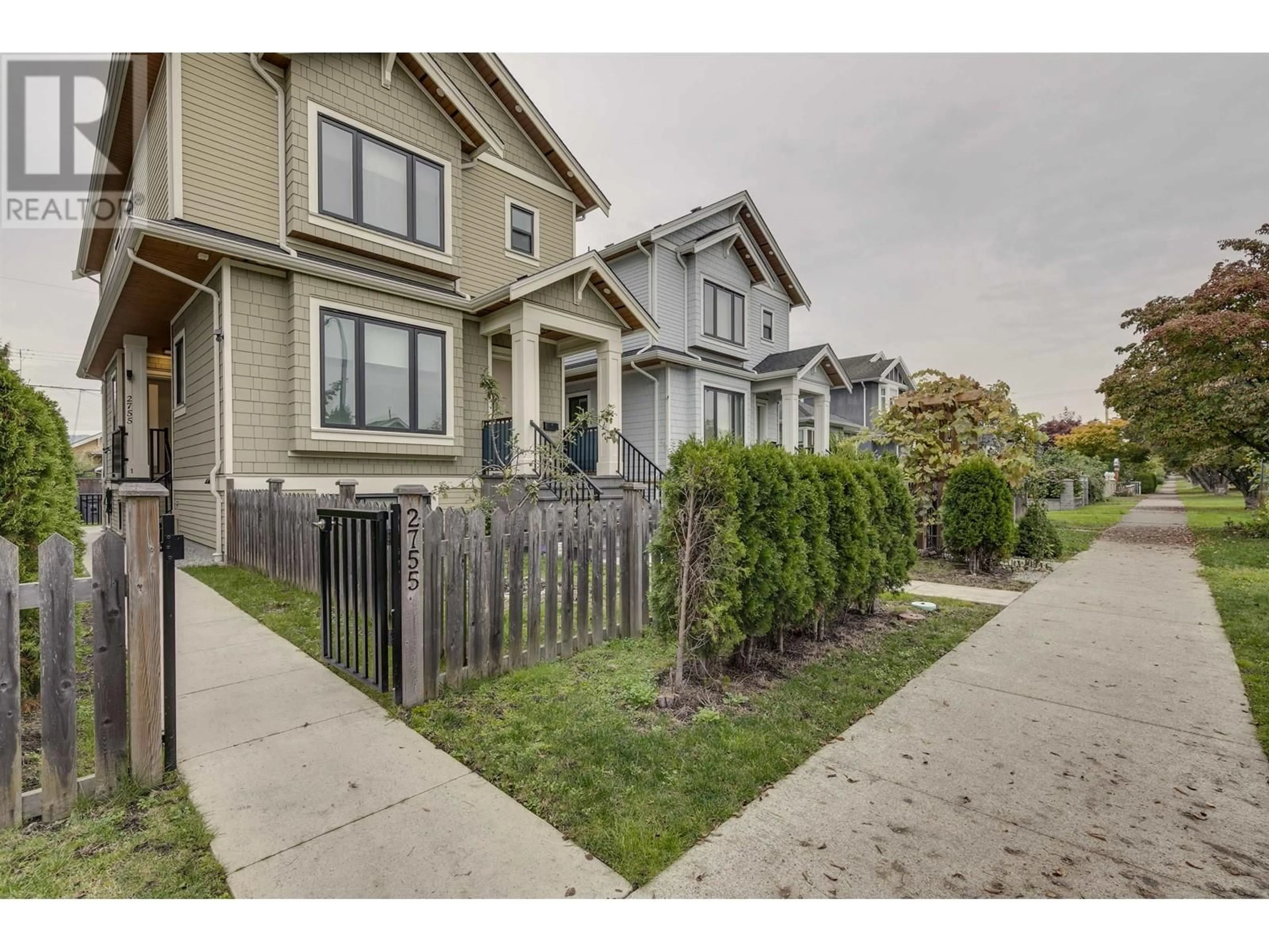 A pic from exterior of the house or condo, the fenced backyard for 2755 CHARLES STREET, Vancouver British Columbia V5K3A6