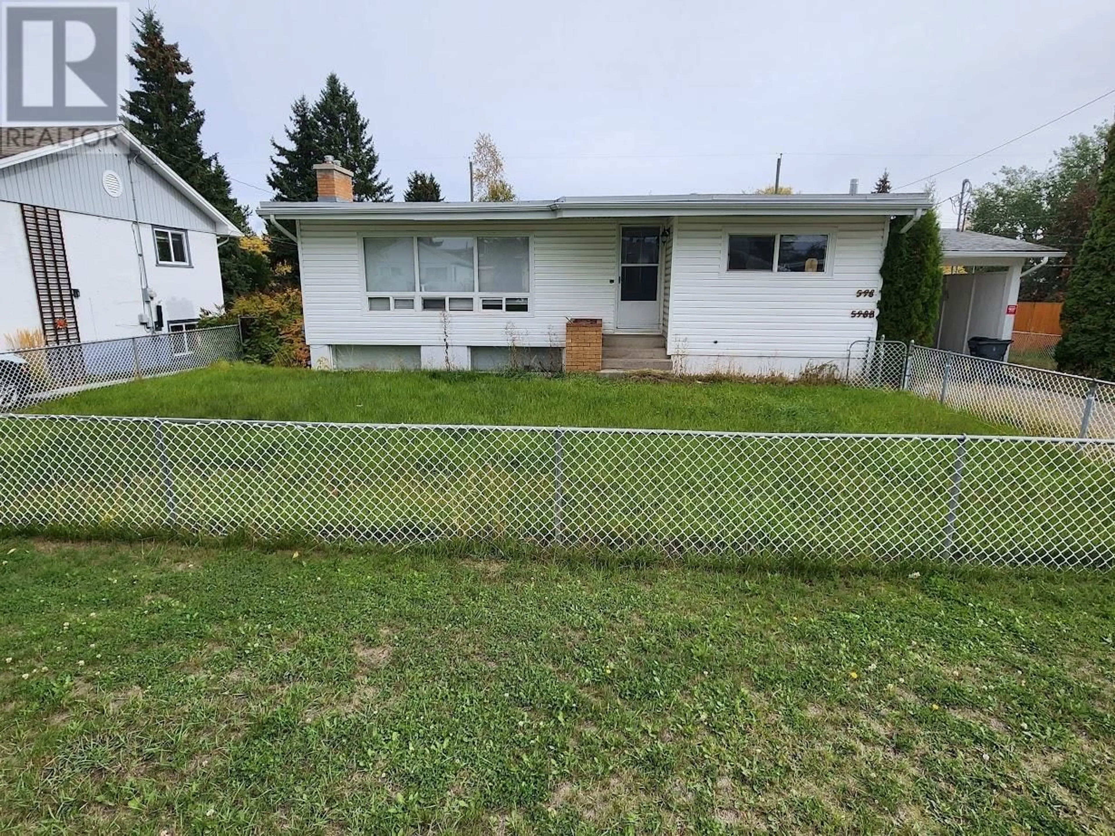 Frontside or backside of a home, the fenced backyard for 598 EWERT STREET, Prince George British Columbia V2M2N7