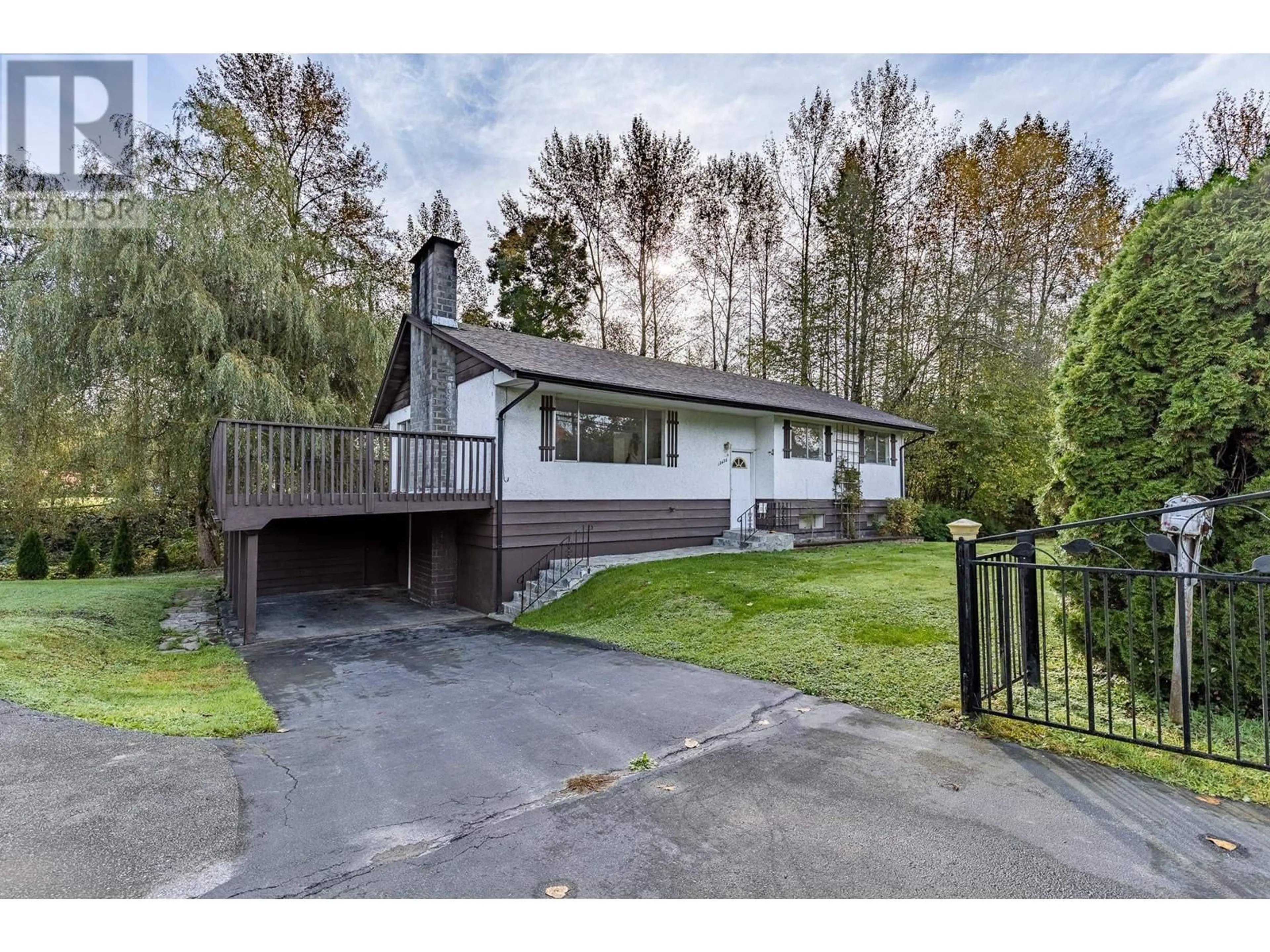 Frontside or backside of a home, cottage for 12438 256 STREET, Maple Ridge British Columbia V4R1C1