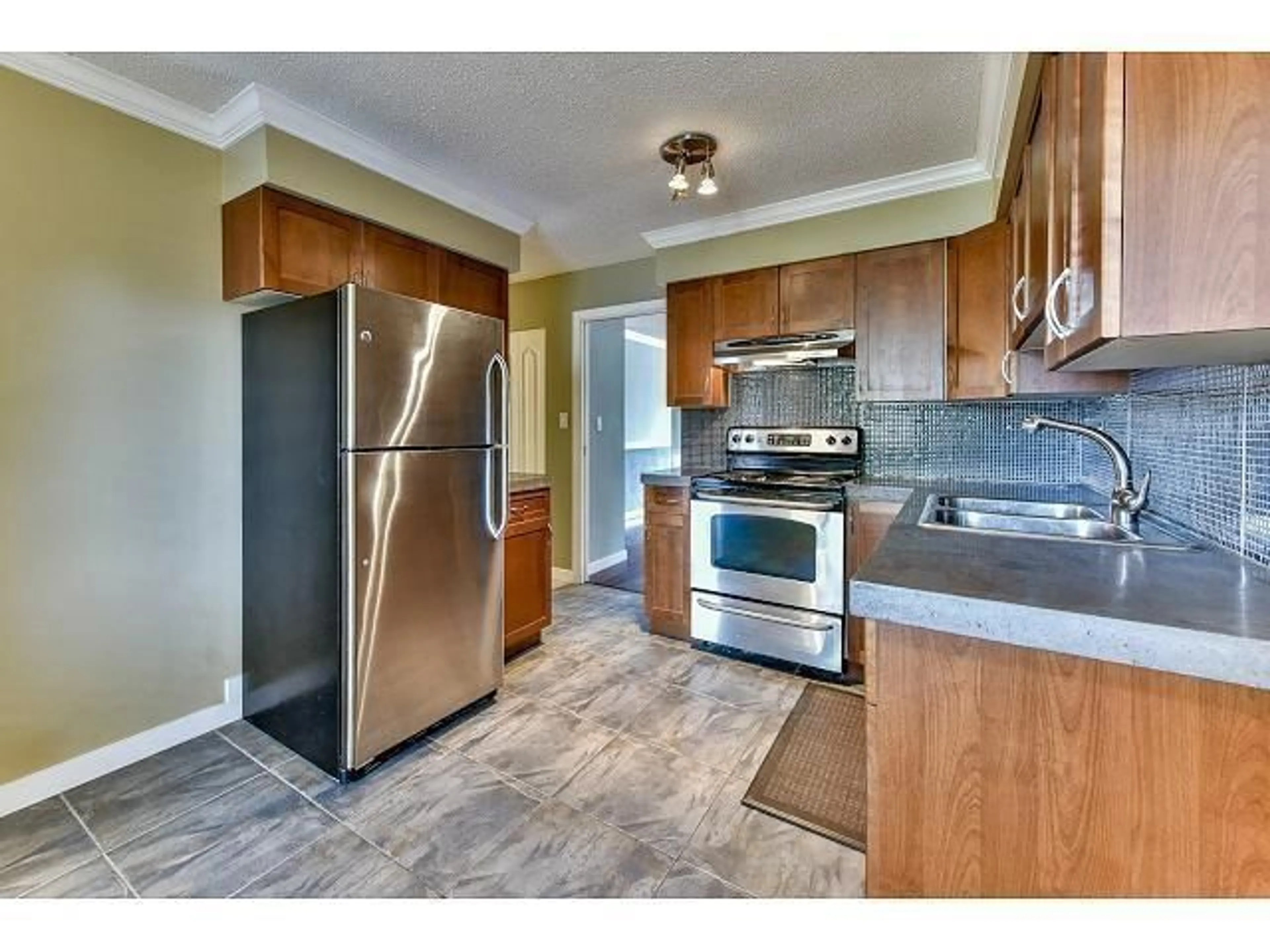 Open concept kitchen for 7902 115A STREET, Delta British Columbia V4C5R6