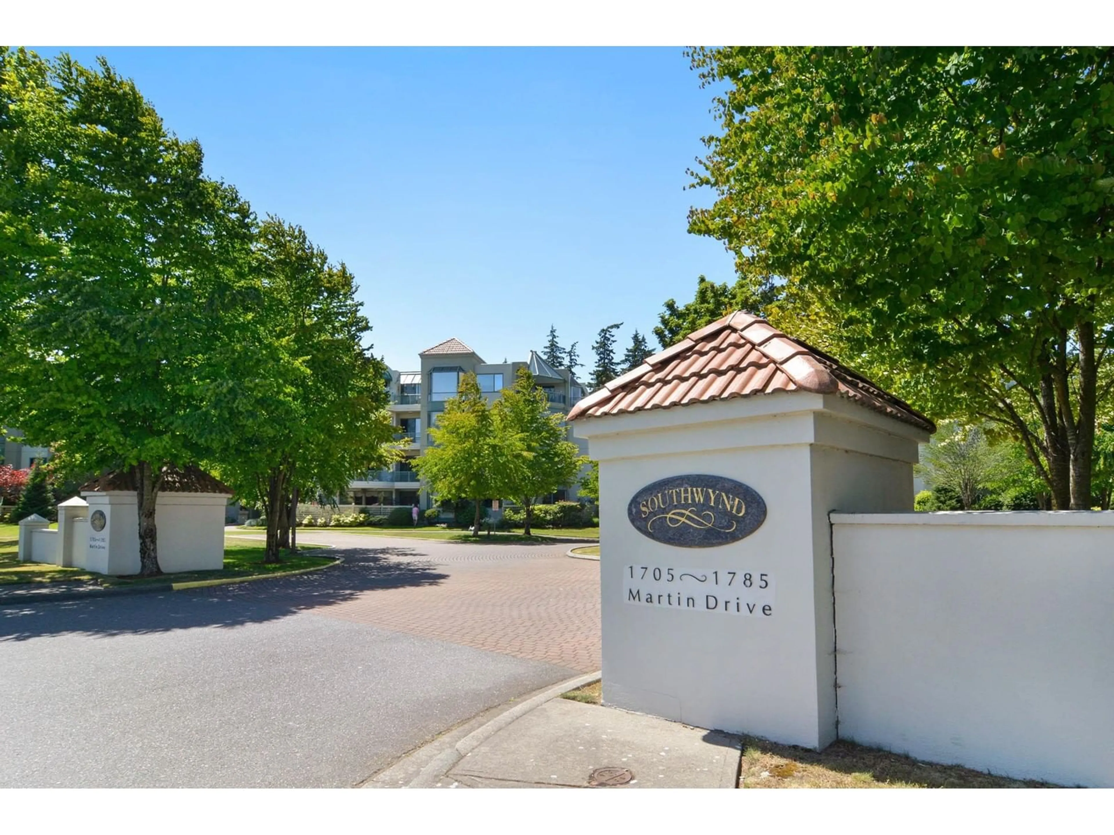 A pic from exterior of the house or condo, the street view for 402 1785 MARTIN DRIVE, Surrey British Columbia V4A9T5