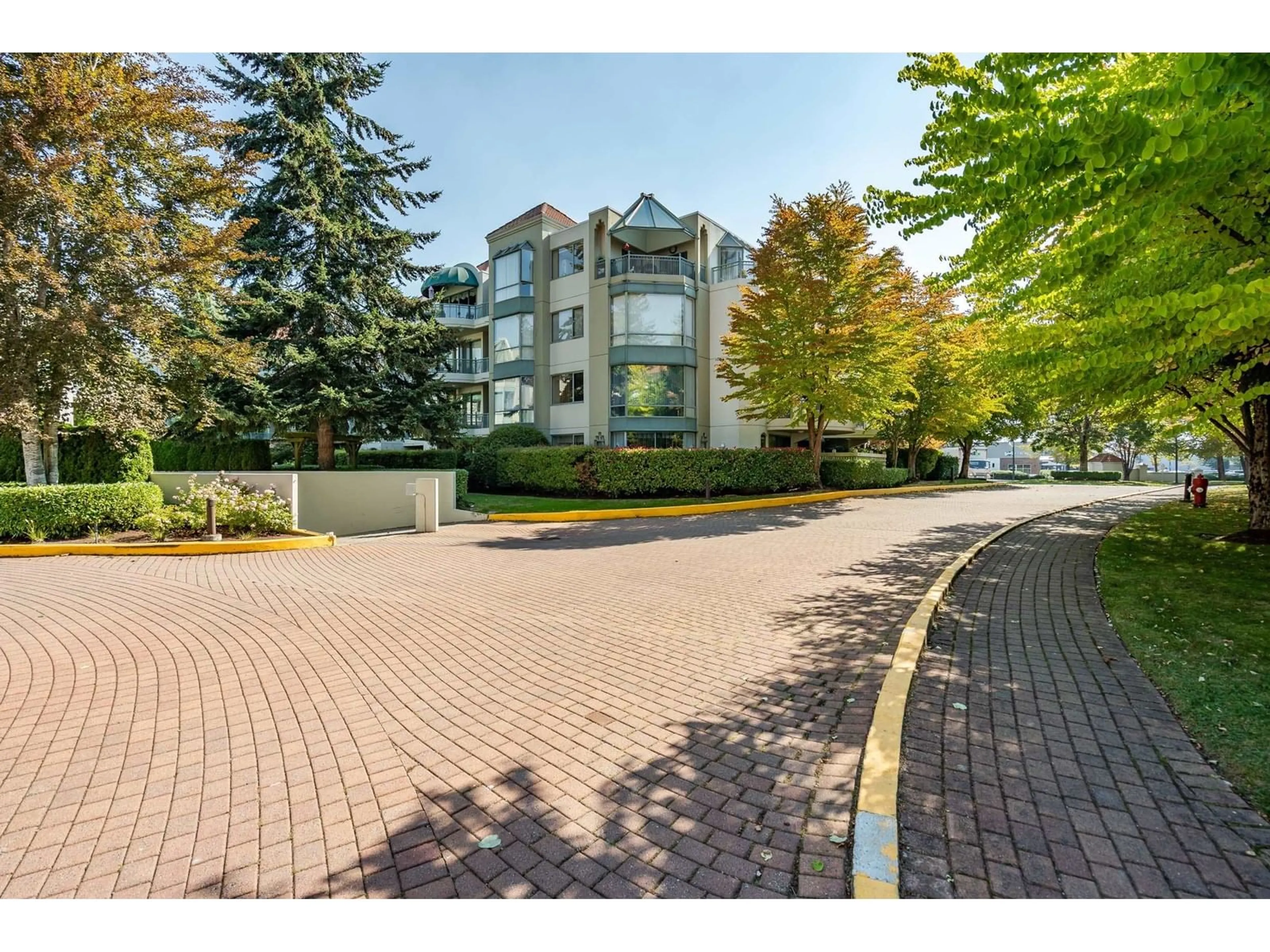 A pic from exterior of the house or condo, the street view for 402 1785 MARTIN DRIVE, Surrey British Columbia V4A9T5