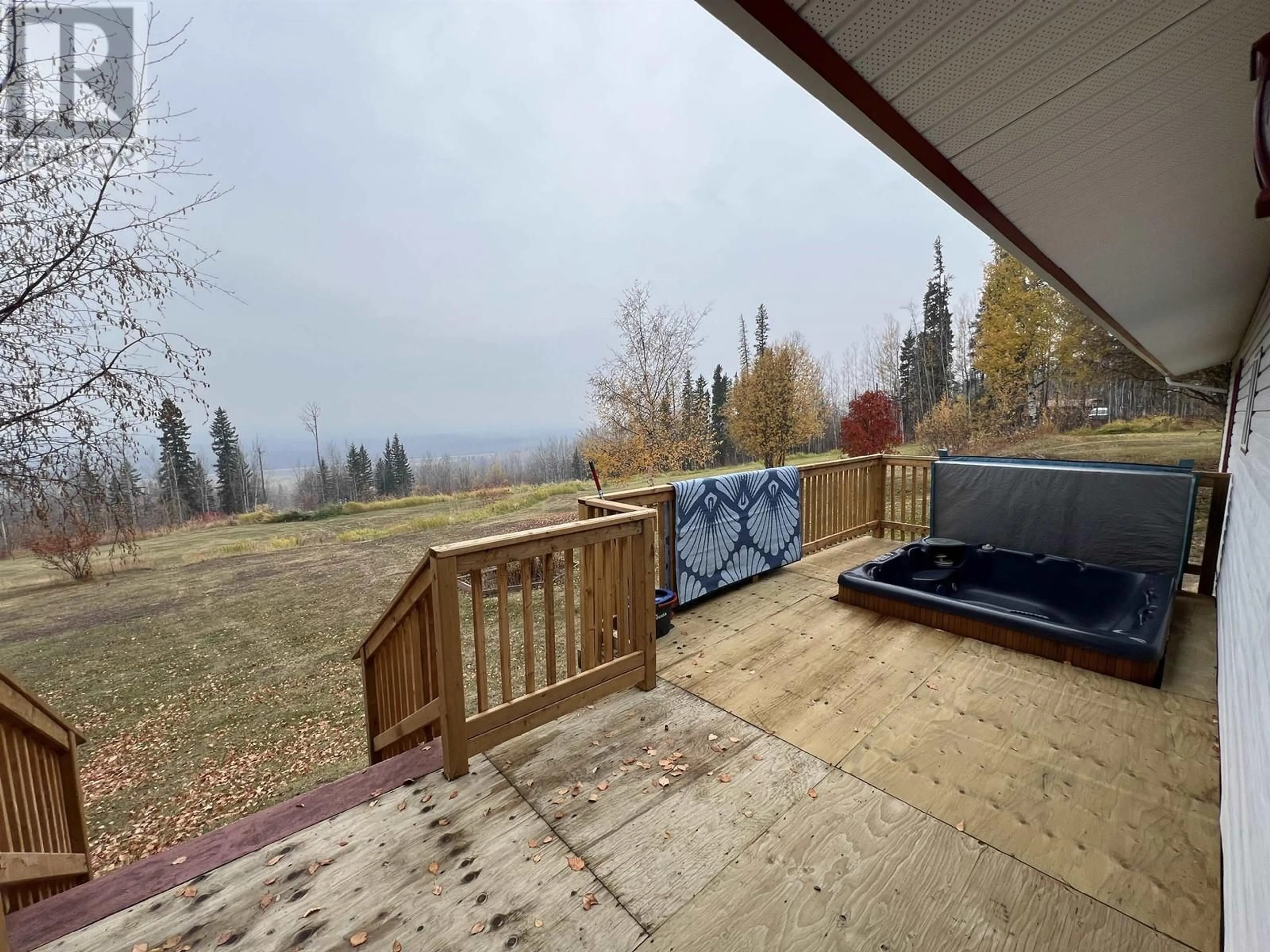 Patio, the fenced backyard for 7511 HIGHLAND DRIVE, Fort Nelson British Columbia V0C1R0