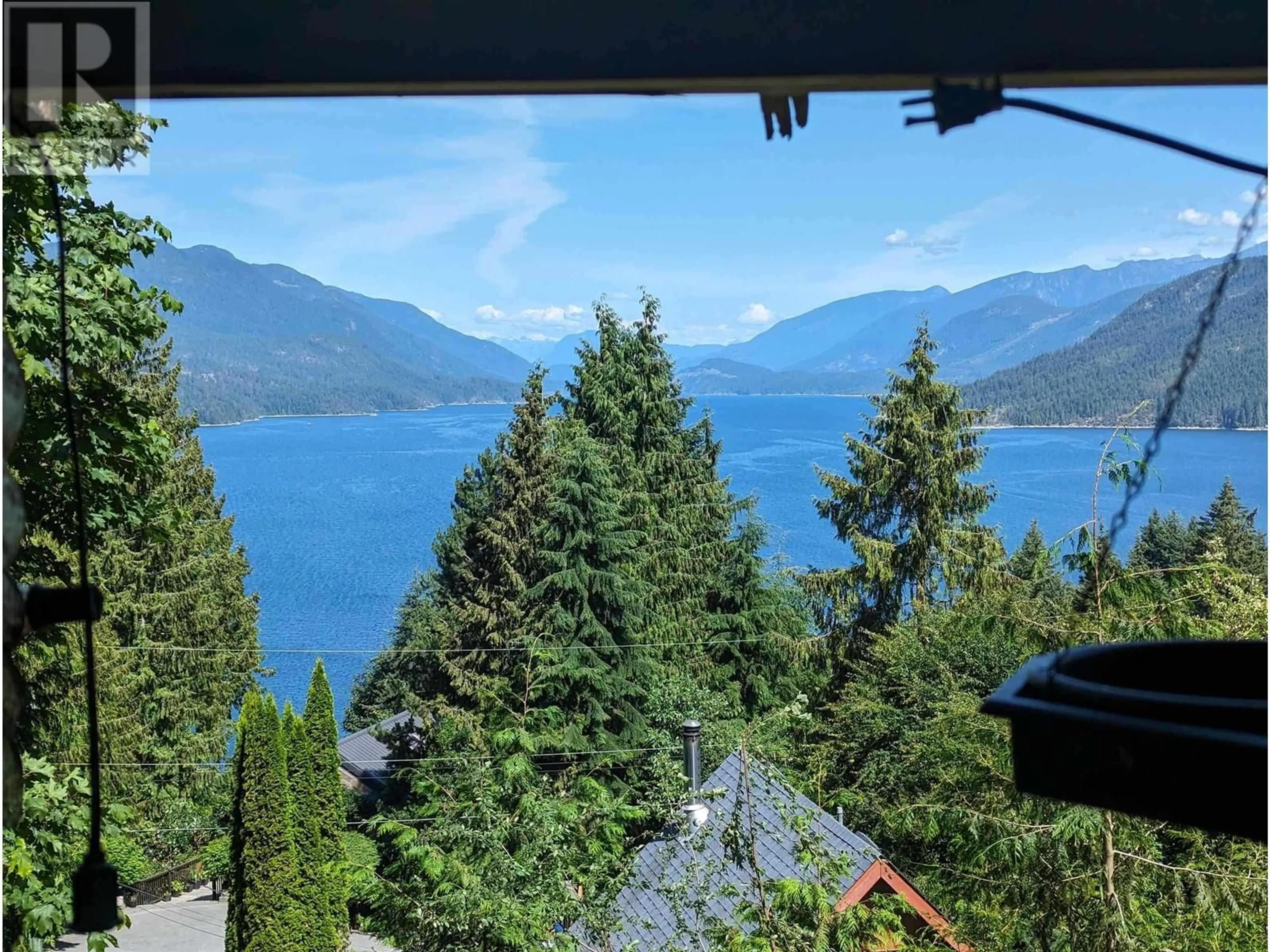 A pic from outside/outdoor area/front of a property/back of a property/a pic from drone, water/lake/river/ocean view for 5894 SKOOKUMCHUK ROAD, Sechelt British Columbia V7Z0E1