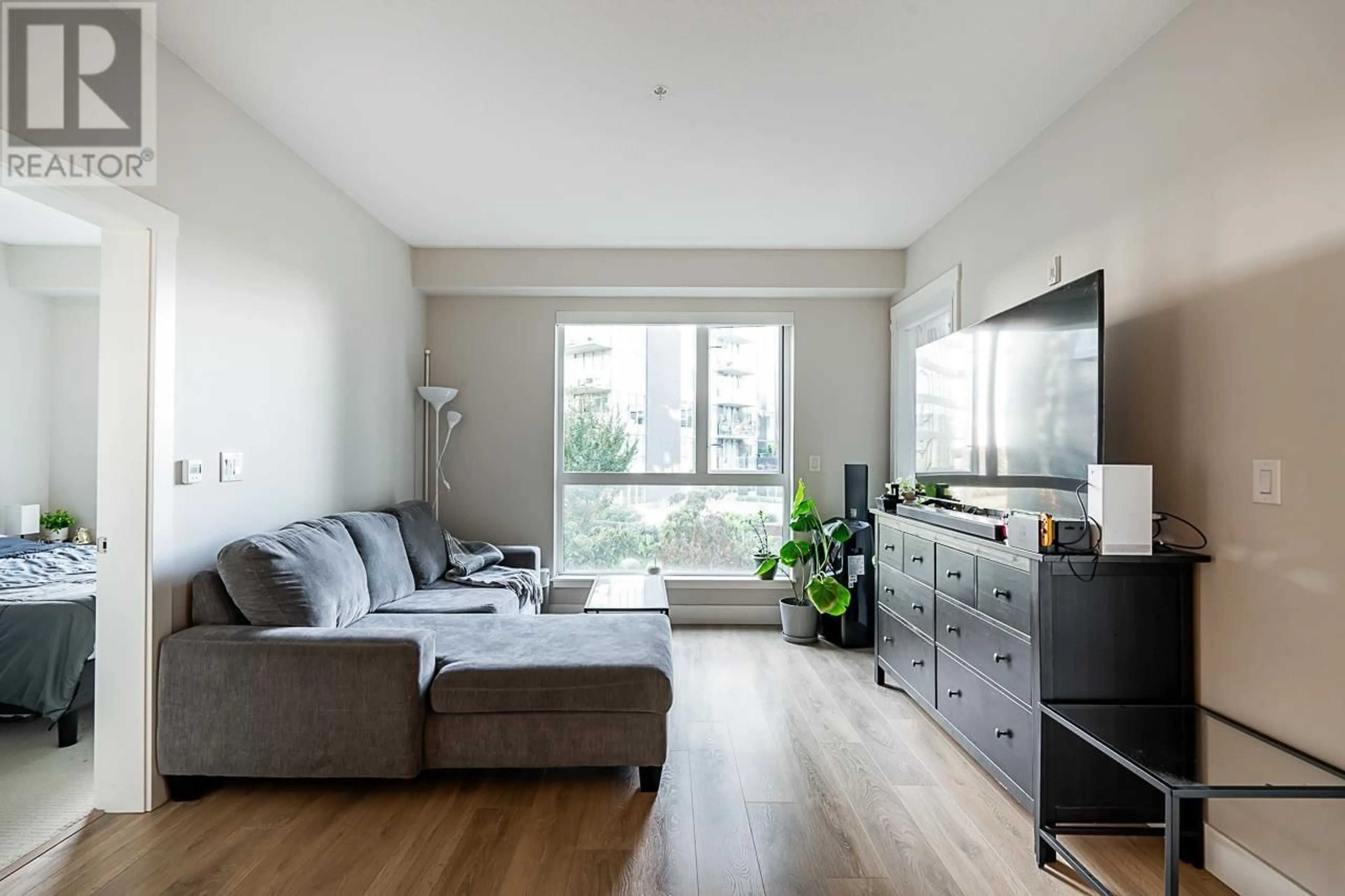 Living room, wood floors for 313 8508 RIVERGRASS DRIVE, Vancouver British Columbia V5S0H7