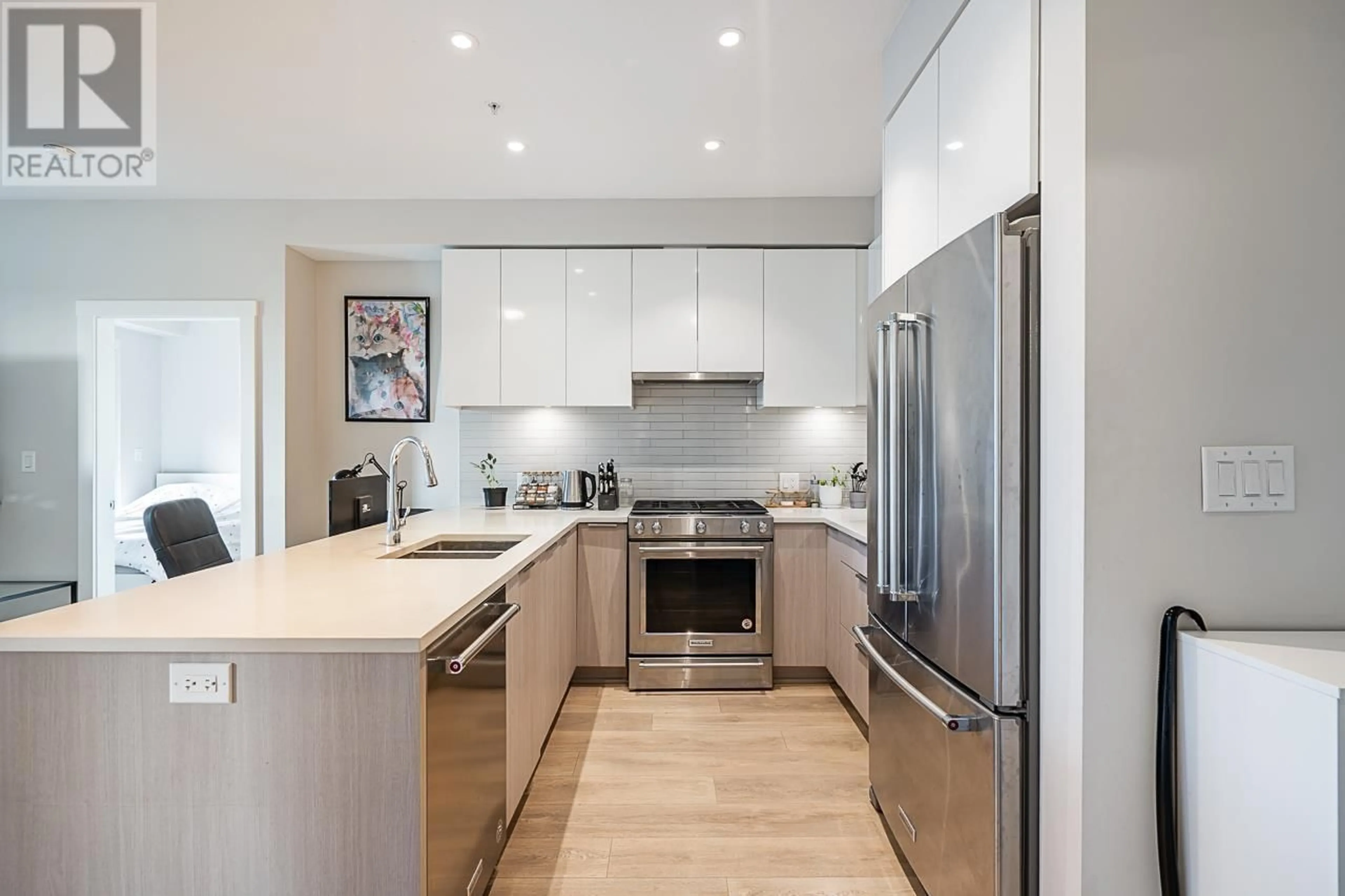 Contemporary kitchen, wood floors for 313 8508 RIVERGRASS DRIVE, Vancouver British Columbia V5S0H7