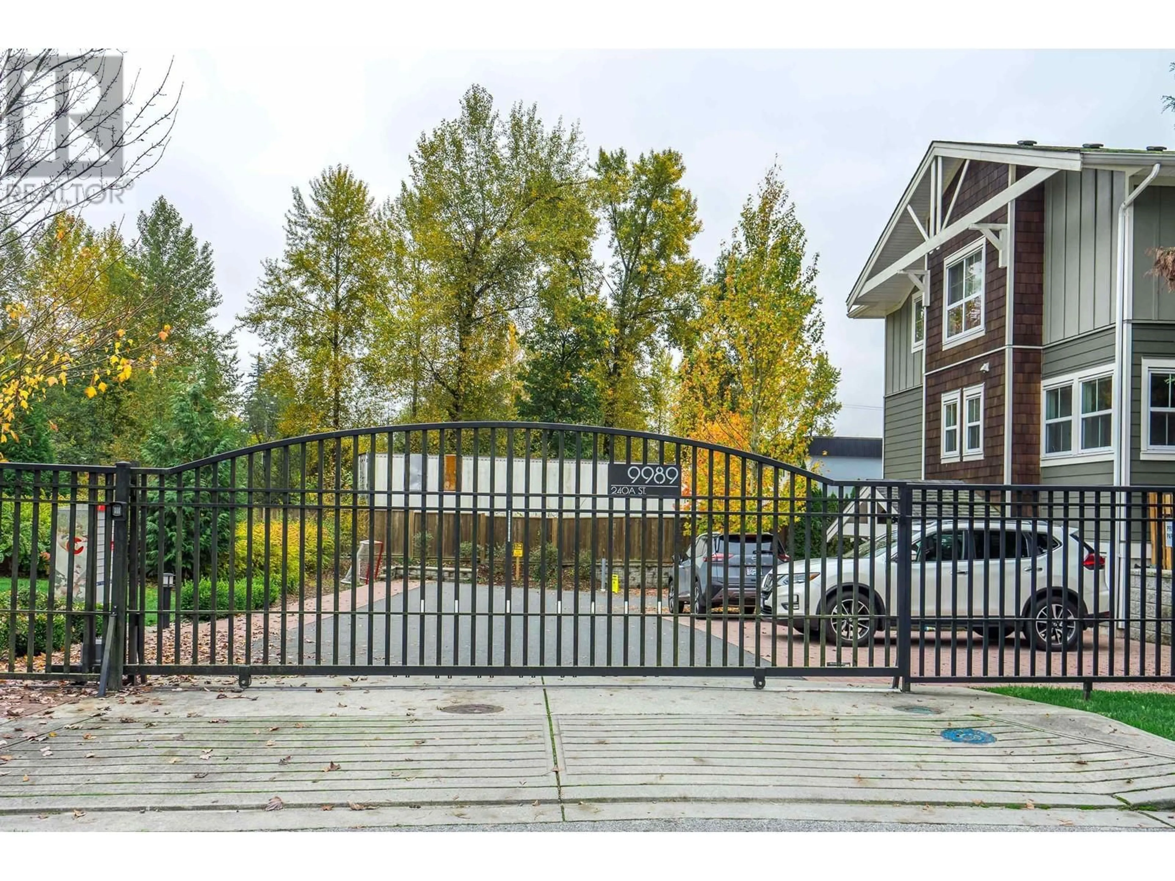 A pic from exterior of the house or condo, the fenced backyard for 15 9989 240A STREET, Maple Ridge British Columbia V2W1Z9