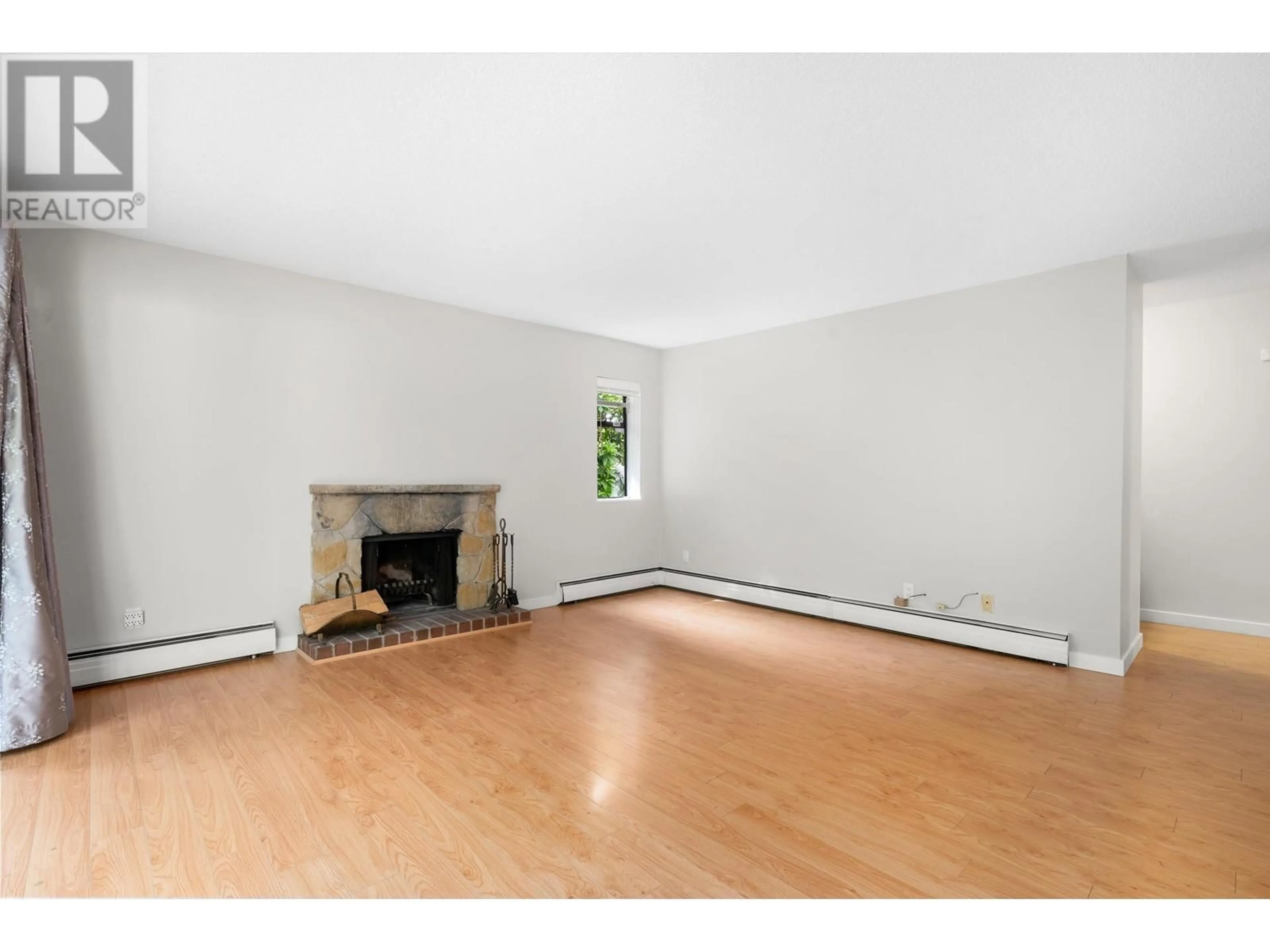 A pic of a room, wood floors for 203 1355 HARWOOD STREET, Vancouver British Columbia V6E3W3