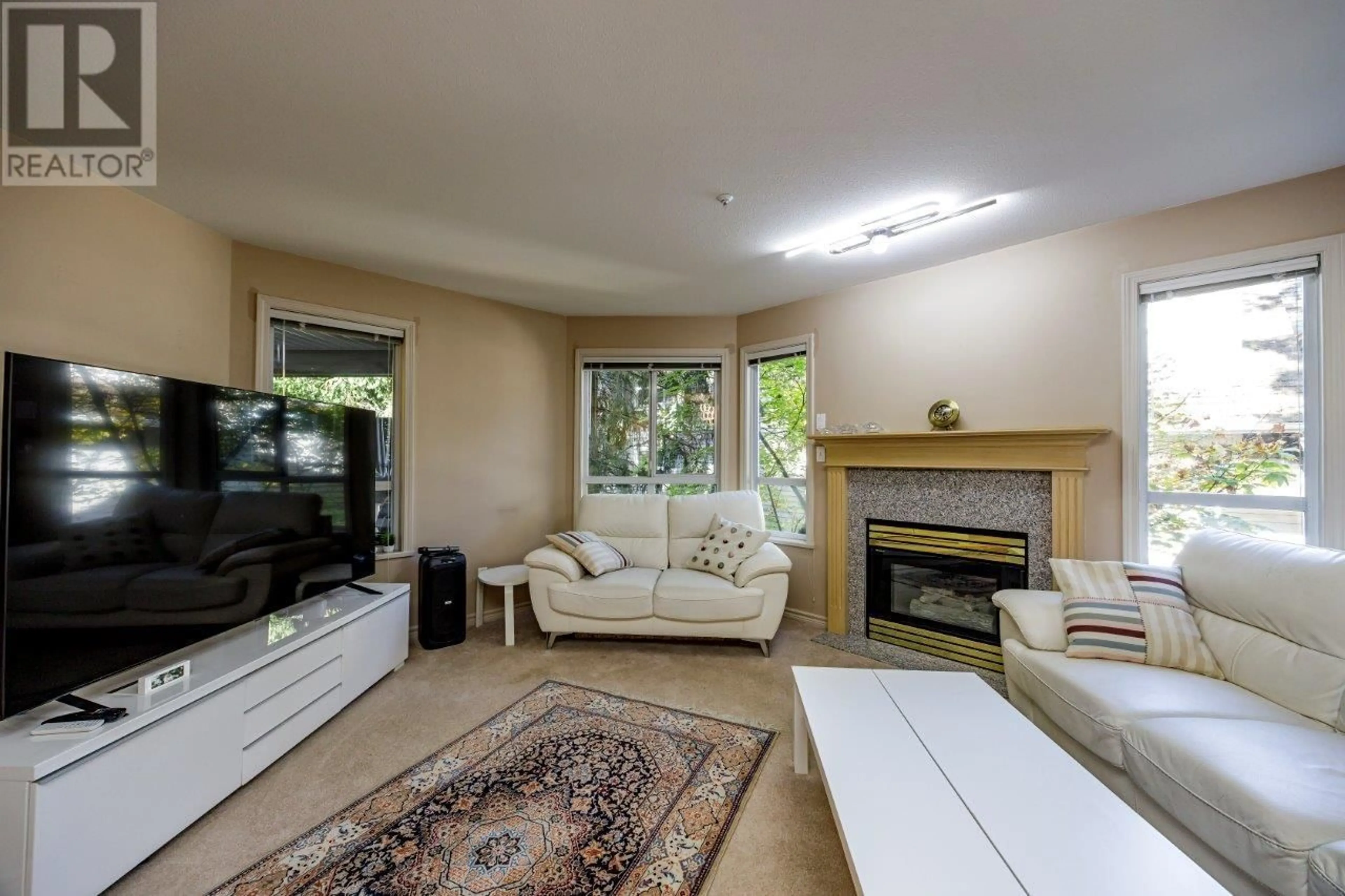 Living room, wood floors for 209 1150 LYNN VALLEY ROAD, North Vancouver British Columbia V7J1Z9