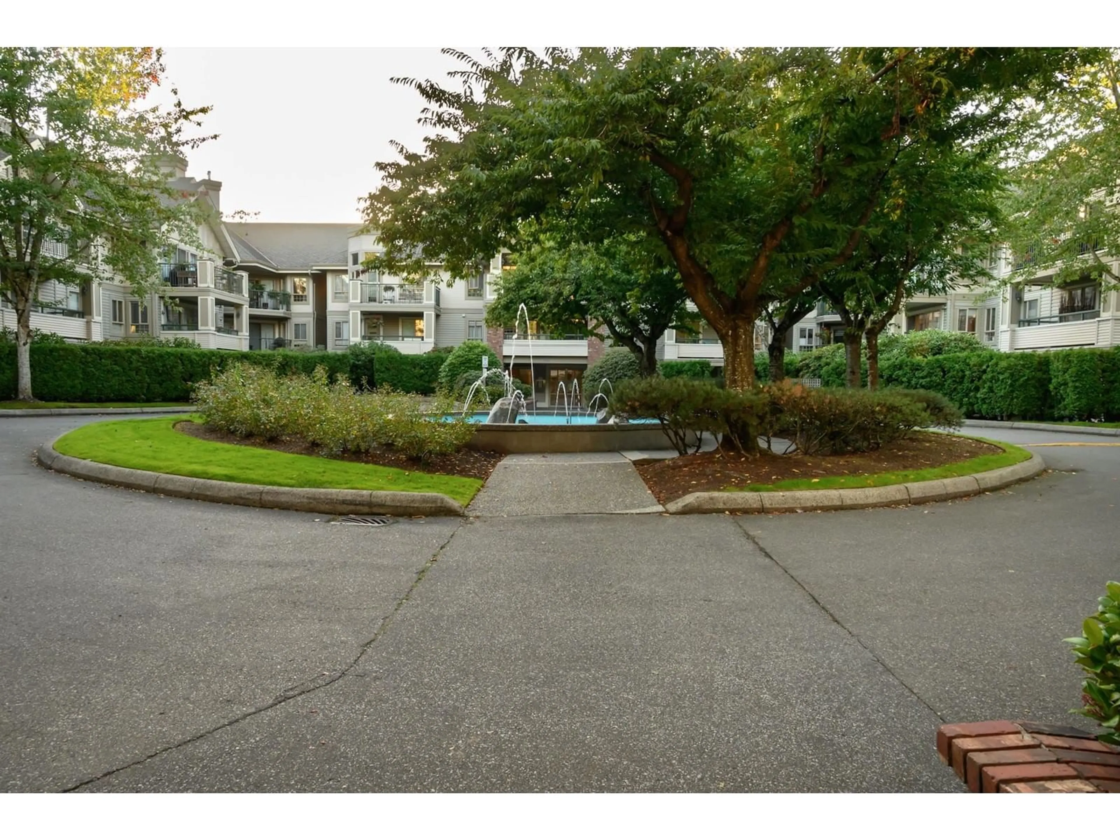 A pic from exterior of the house or condo, the street view for 314 22025 48 AVENUE, Langley British Columbia V3A8L2