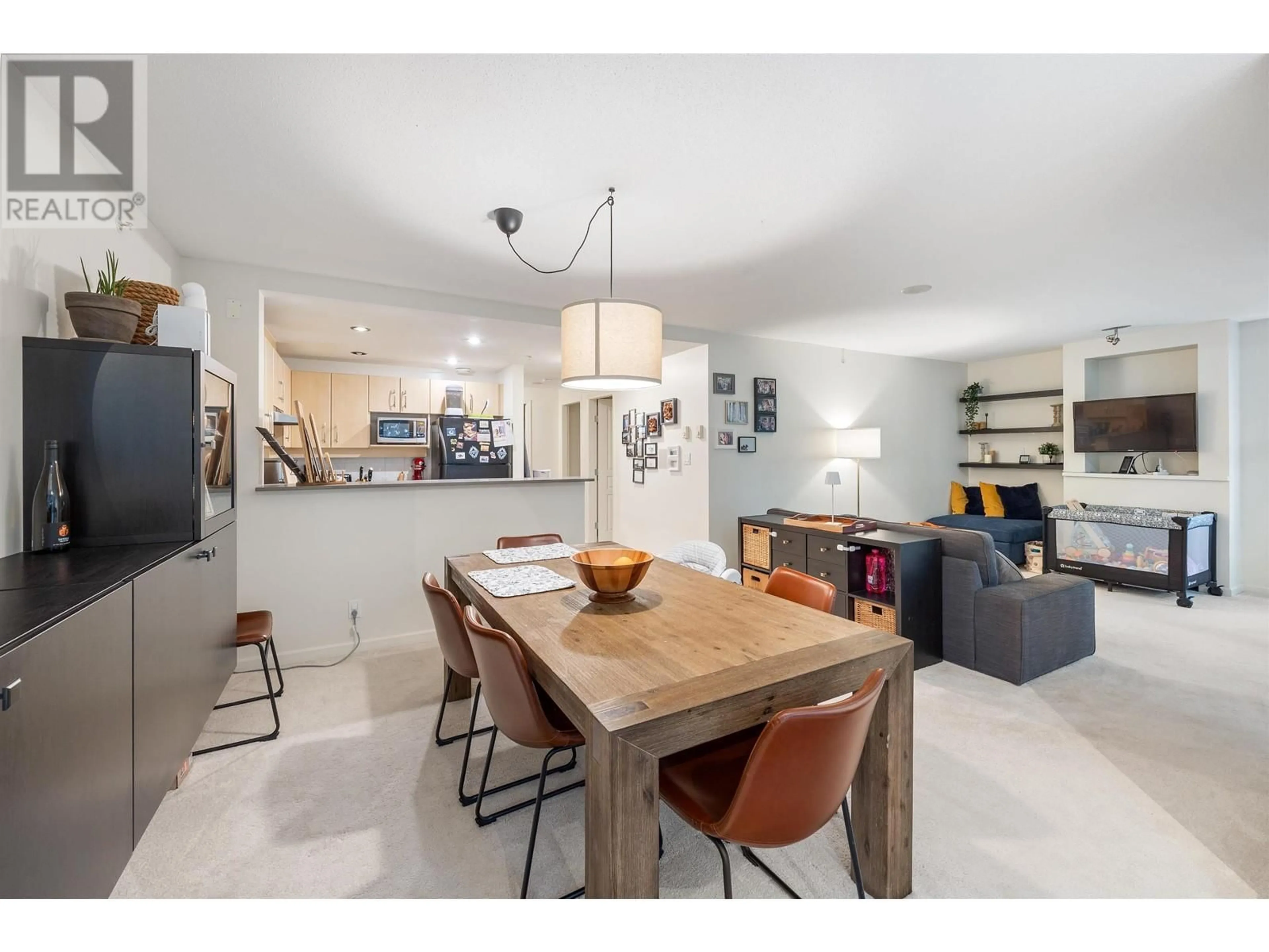 Open concept kitchen for 004 9288 UNIVERSITY CRESCENT, Burnaby British Columbia V5A4X7