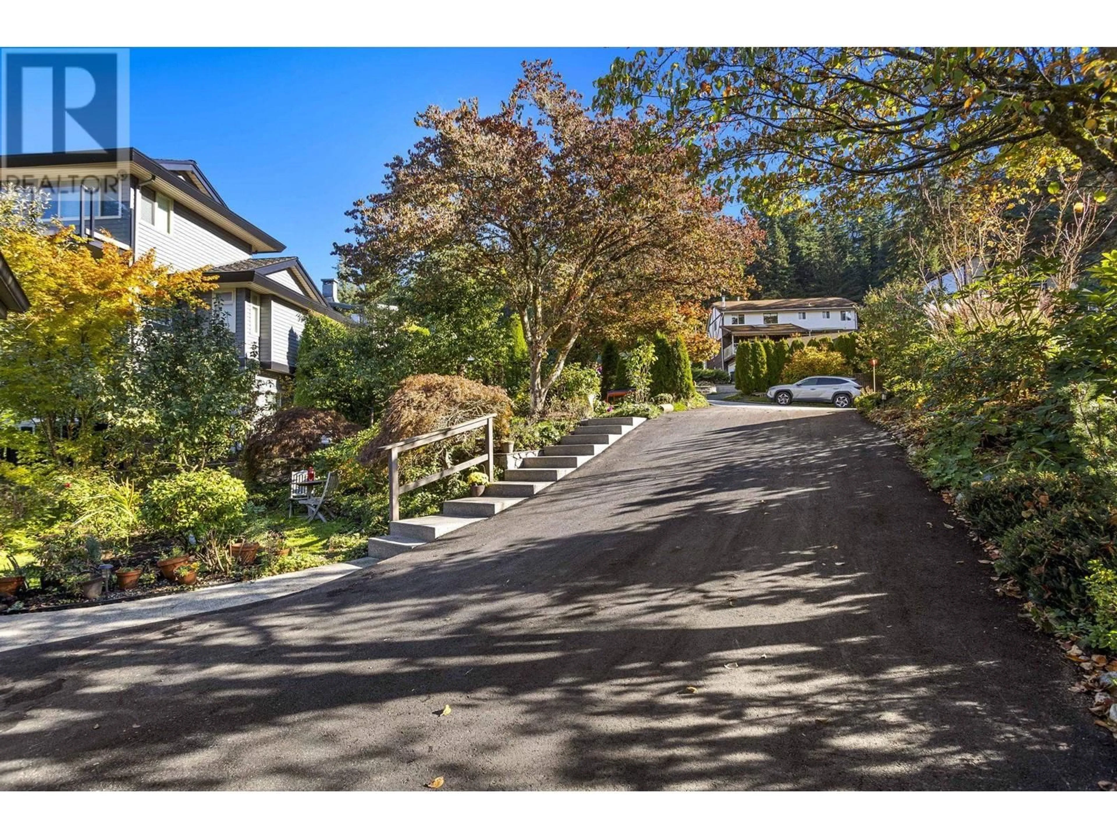 Frontside or backside of a home, the street view for 15 ELSDON BAY, Port Moody British Columbia V3H3Z2