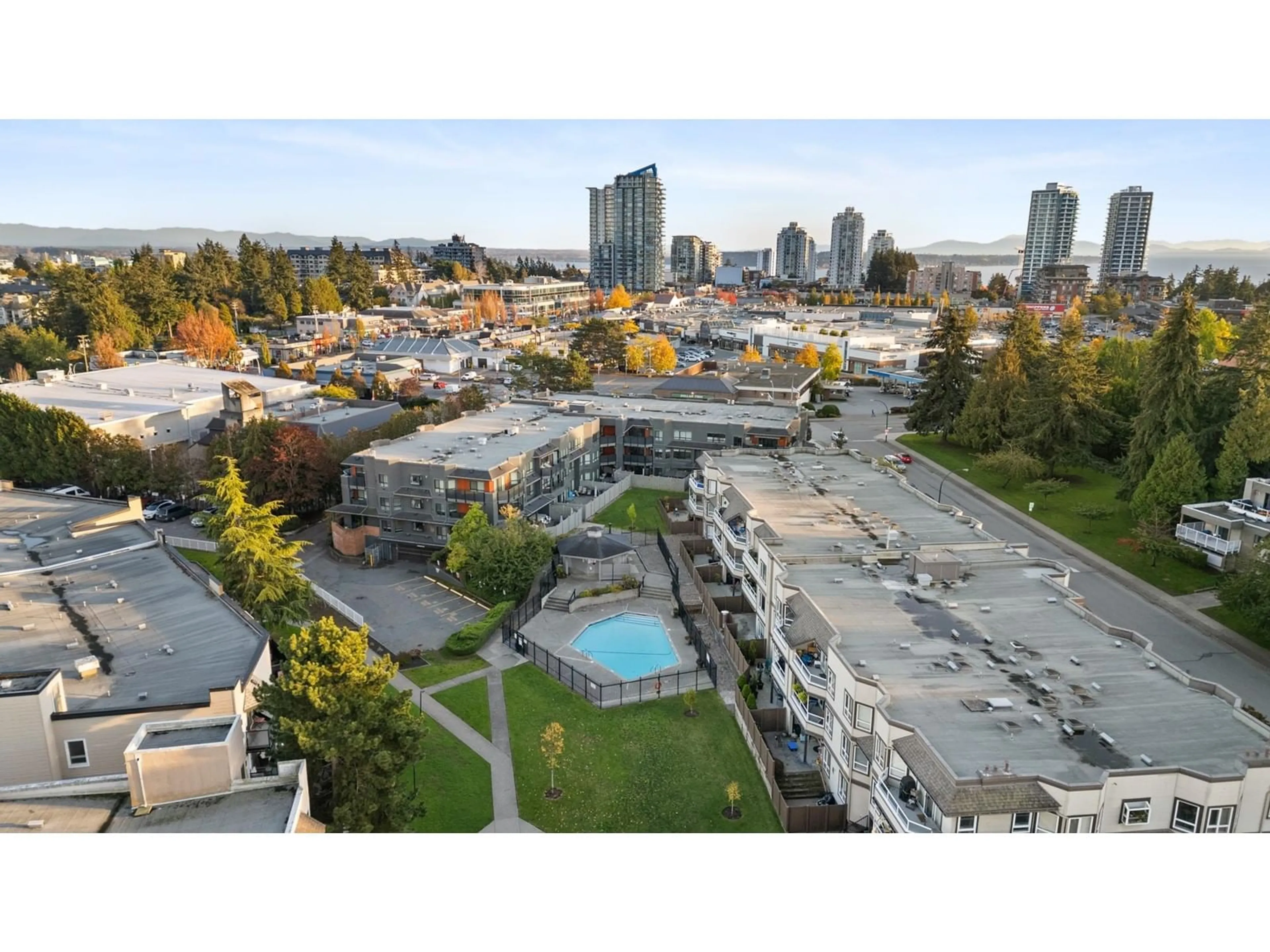 A pic from exterior of the house or condo, the view of city buildings for 112 1870 E SOUTHMERE CRESCENT, Surrey British Columbia V4A7A3