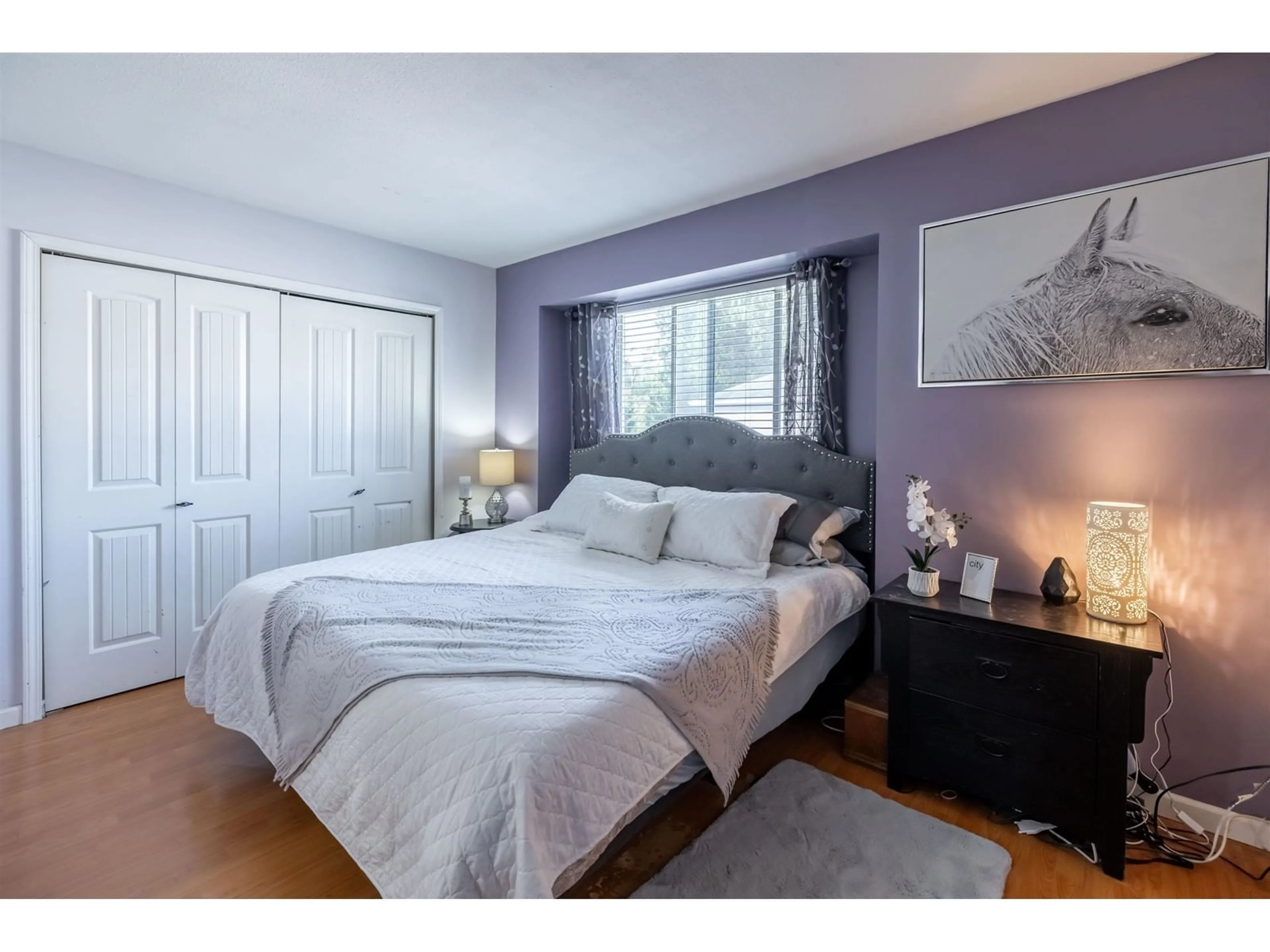 A pic of a room, wood floors for 105 9507 208 STREET, Langley British Columbia V1M2Z1