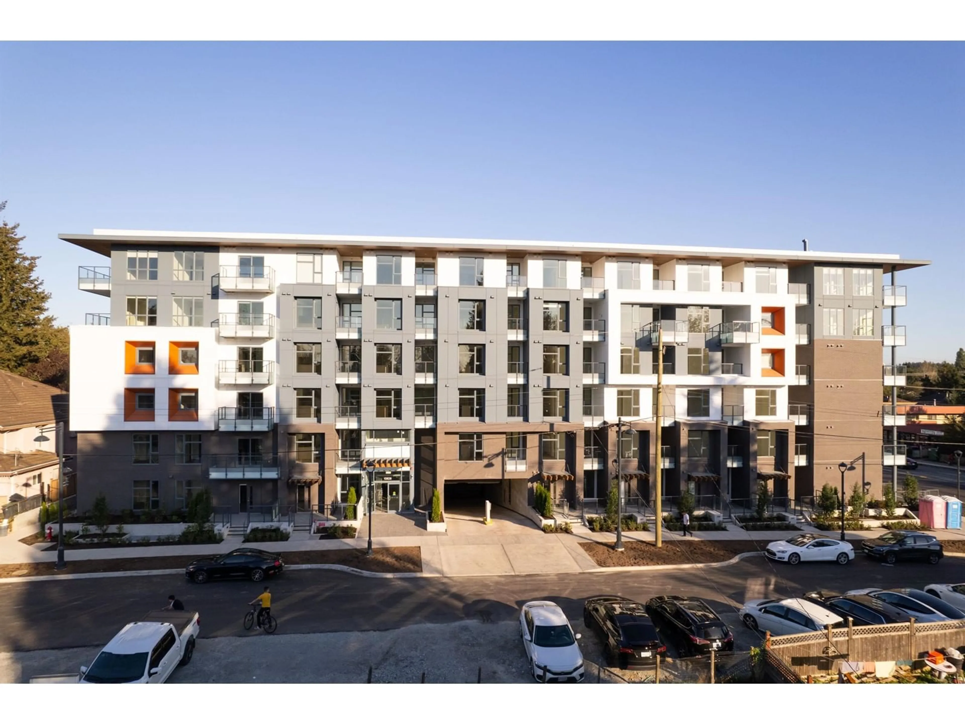 A pic from outside/outdoor area/front of a property/back of a property/a pic from drone, building for W202 - 10828 139A, Surrey British Columbia V3R0H3
