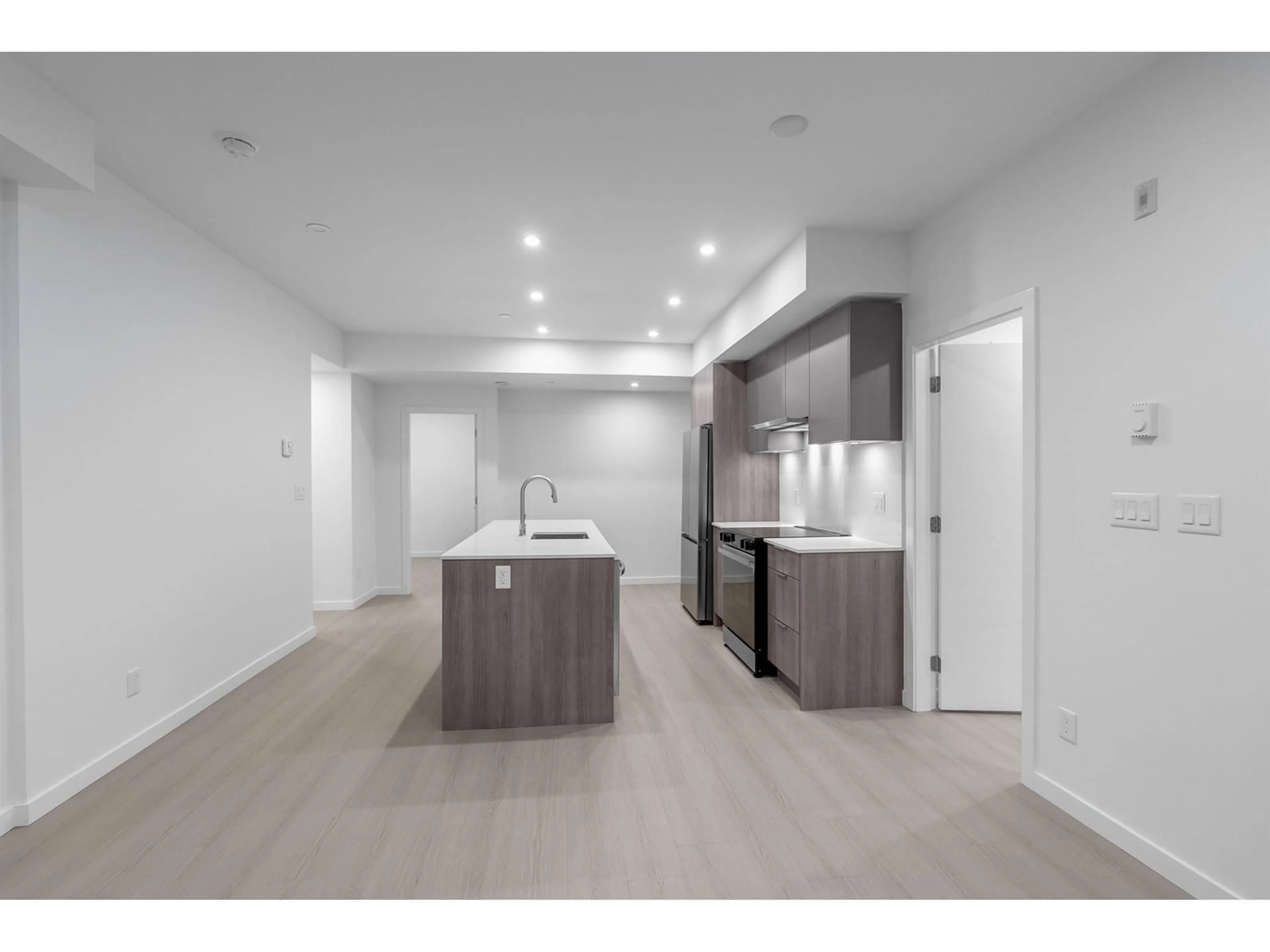 Open concept kitchen for W202 10828 139A STREET, Surrey British Columbia V3R0H3