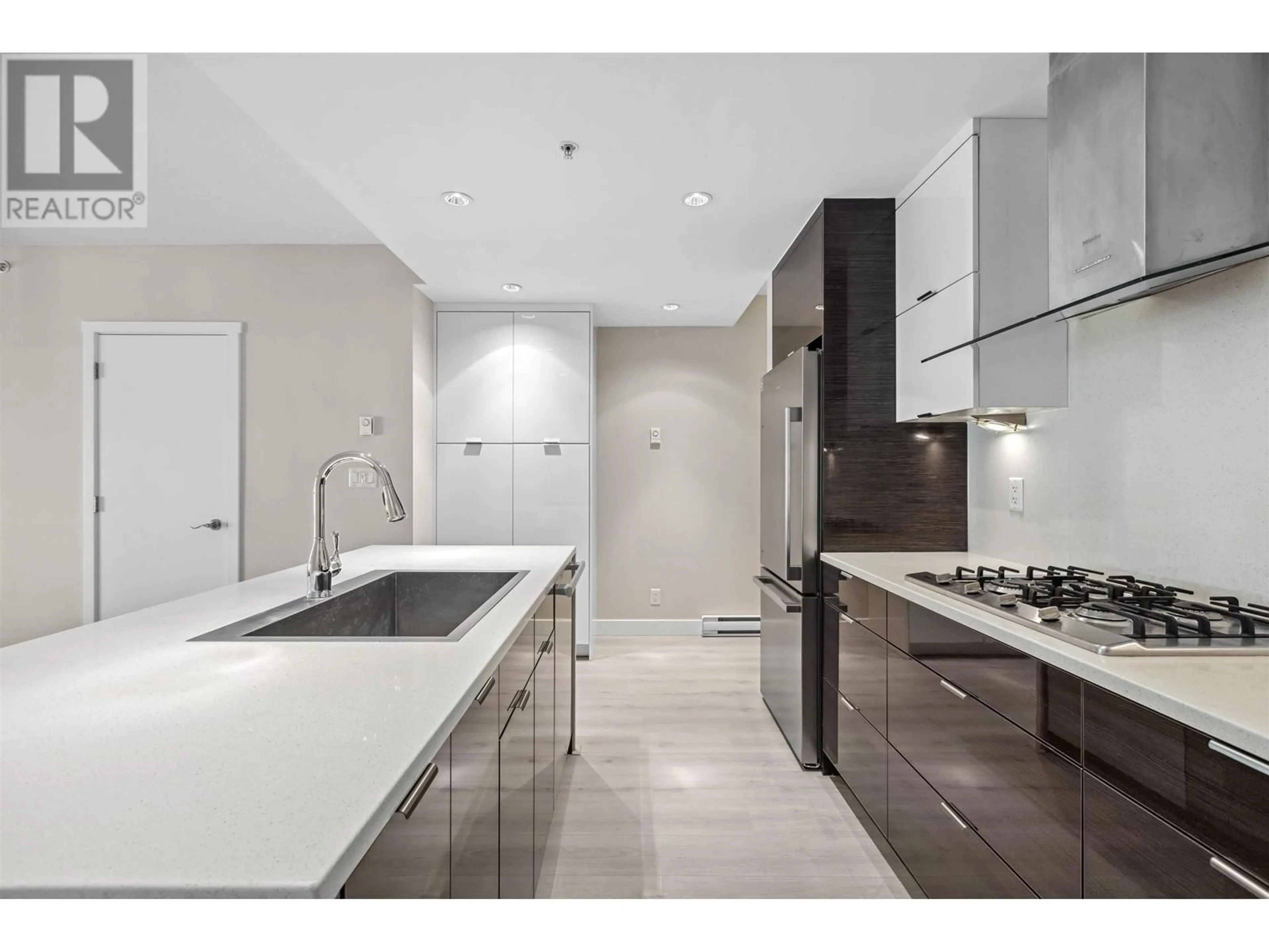 Contemporary kitchen, ceramic floors for 1782 W 6TH AVENUE, Vancouver British Columbia V6J5E8