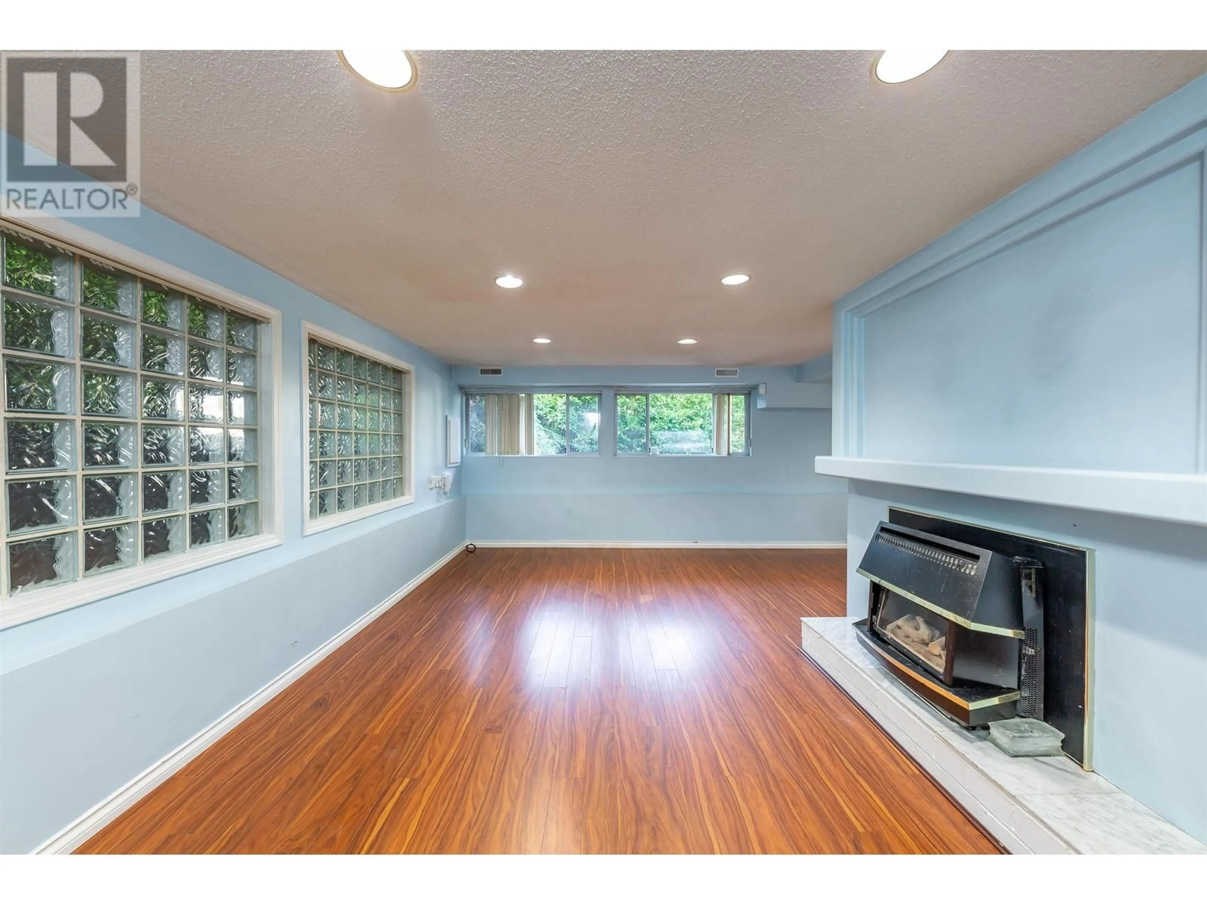 A pic of a room, wood floors for 7674 BURRIS STREET, Burnaby British Columbia V5E1Z3