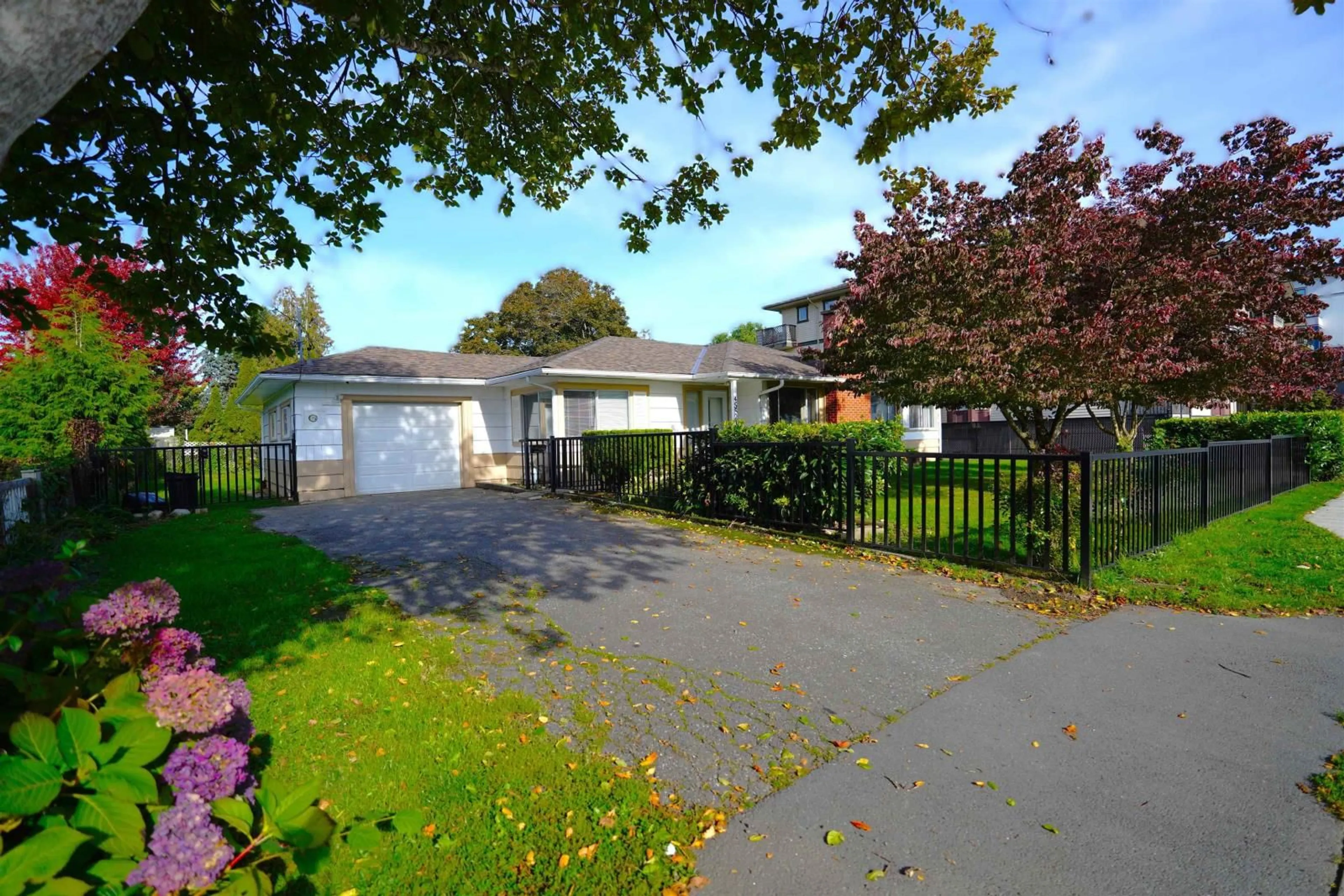 Frontside or backside of a home, the fenced backyard for 45521 SPADINA AVENUE, Chilliwack British Columbia V2P1V2