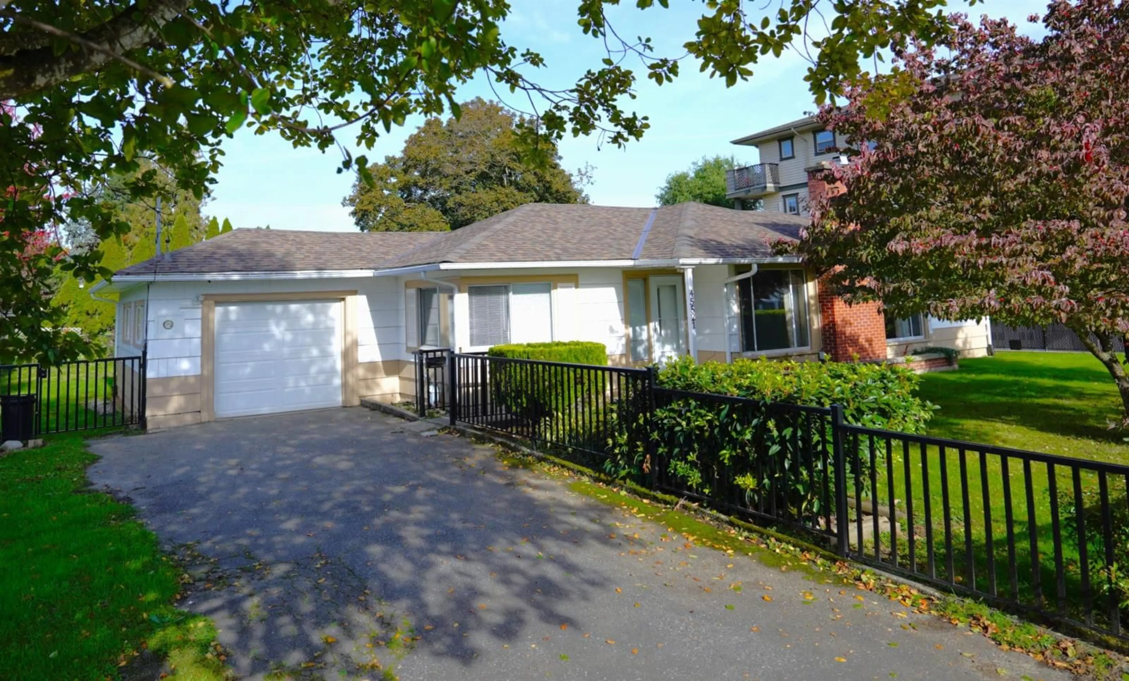 A pic from exterior of the house or condo, the fenced backyard for 45521 SPADINA AVENUE, Chilliwack British Columbia V2P1V2