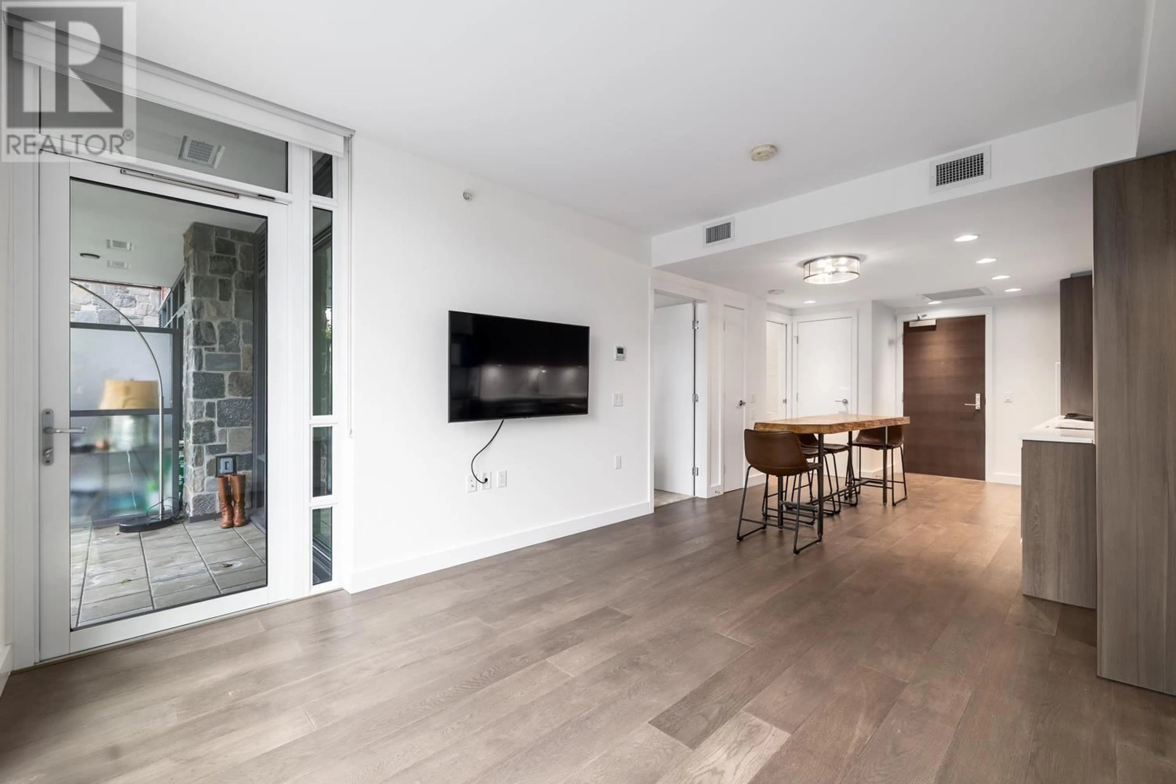 Indoor entryway, wood floors for 108 2738 LIBRARY LANE, North Vancouver British Columbia V7J0B3