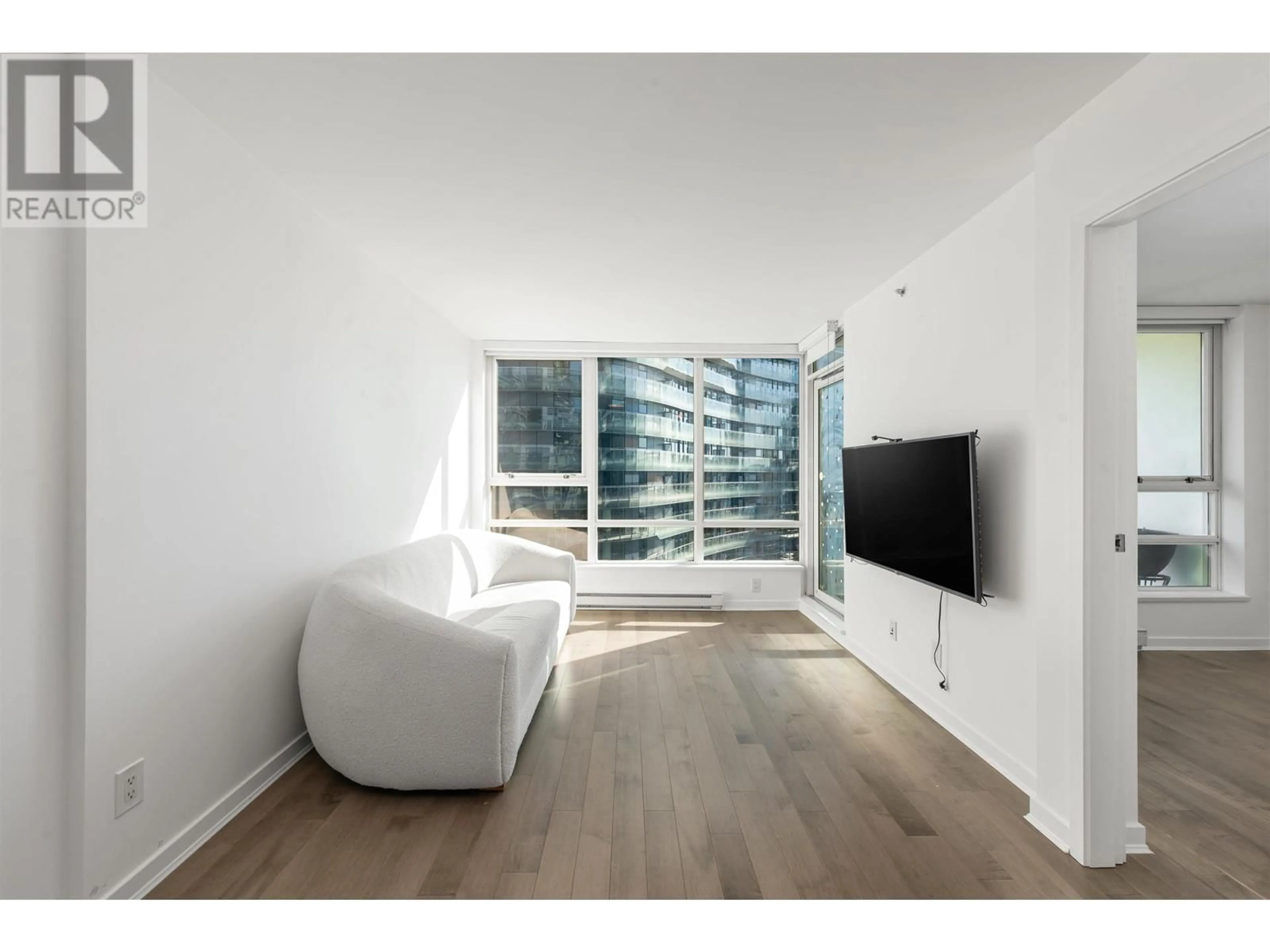 A pic of a room, wood floors for 1603 939 EXPO BOULEVARD, Vancouver British Columbia V6Z3G7