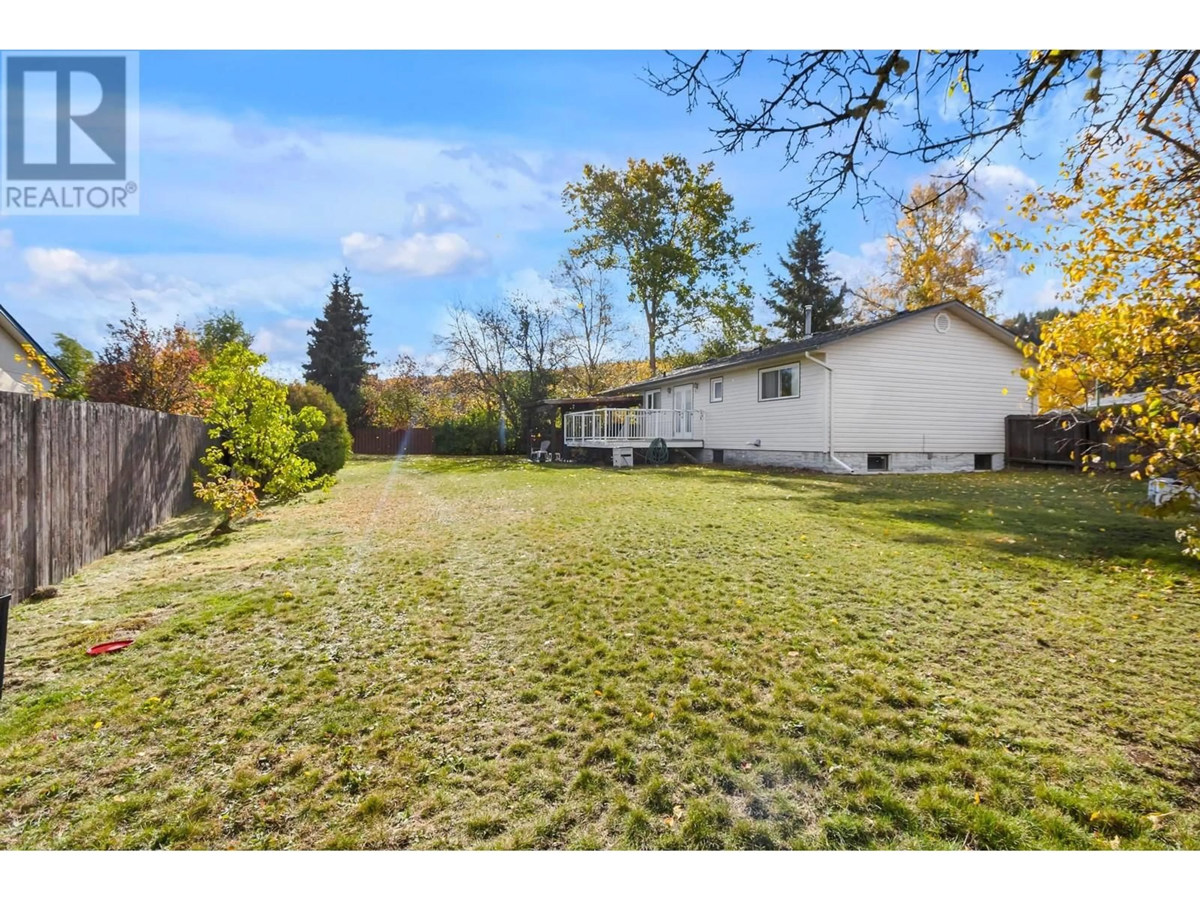 Frontside or backside of a home, the fenced backyard for 1160 MICA AVENUE, Prince George British Columbia V2M4Z7