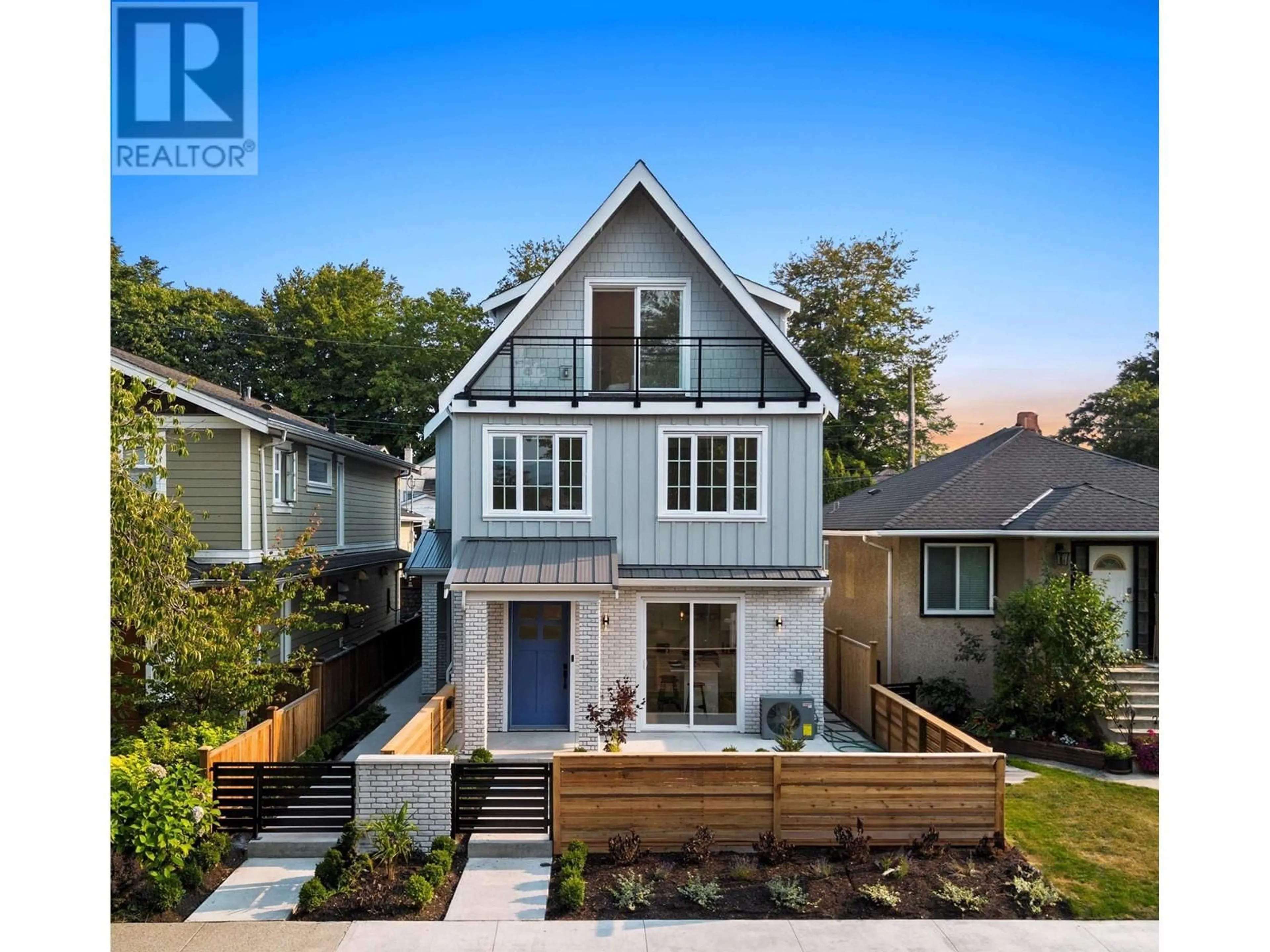 Frontside or backside of a home, the fenced backyard for 1 2616 NAPIER STREET, Vancouver British Columbia V5K2W6