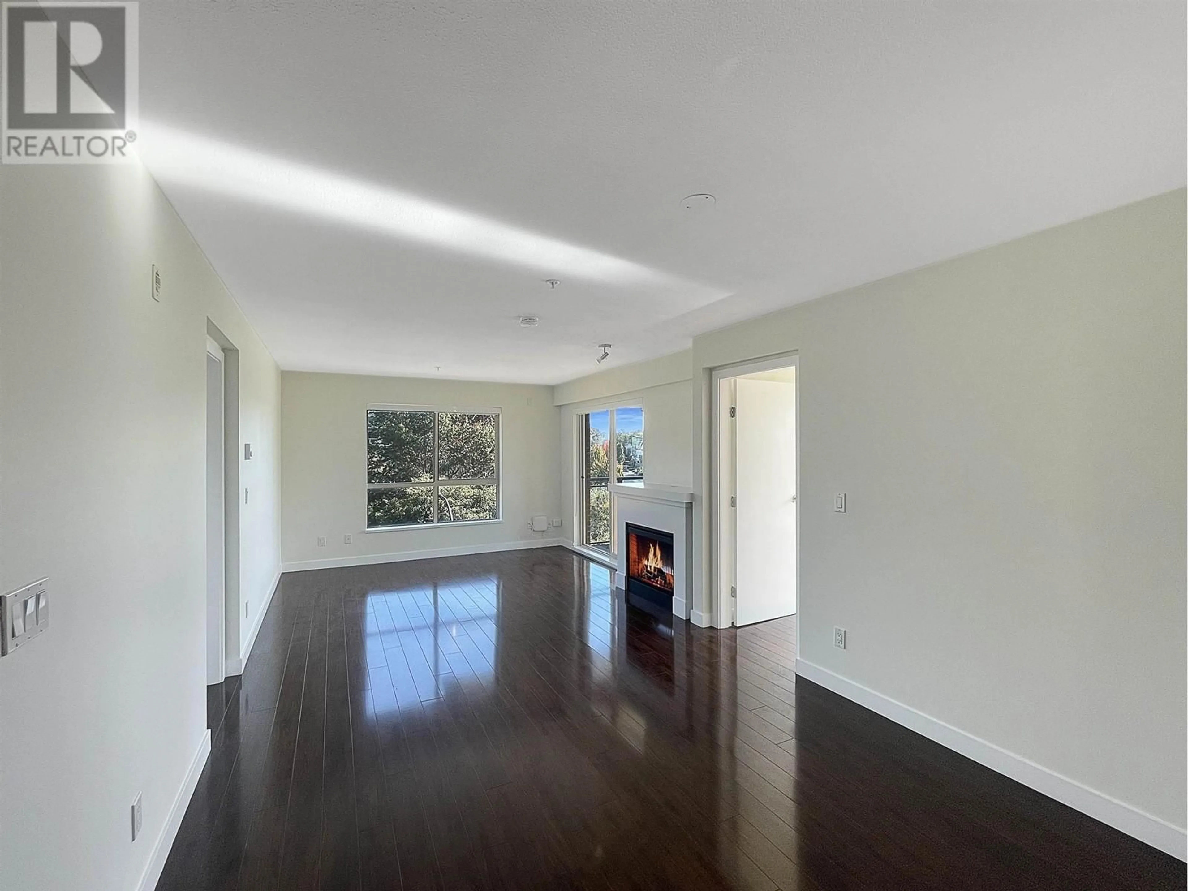 A pic of a room, wood floors for 305 1633 MACKAY AVENUE, North Vancouver British Columbia V7P0A2