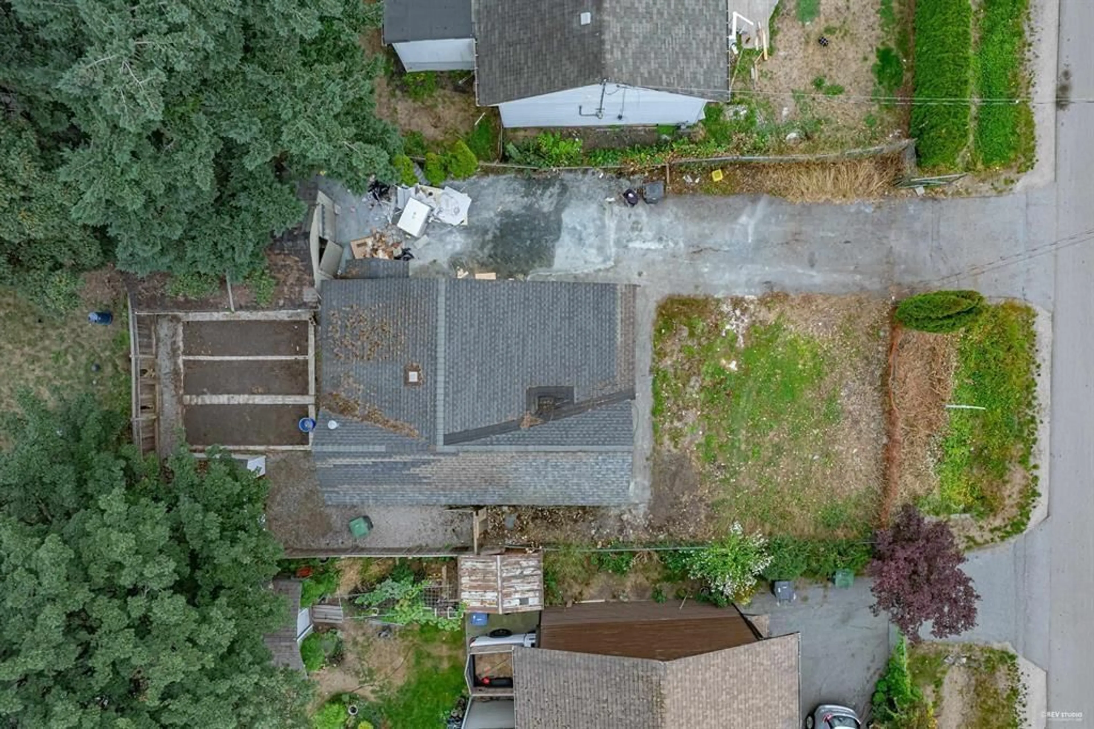 Frontside or backside of a home, the fenced backyard for 12711 115A AVENUE, Surrey British Columbia V3V3P9