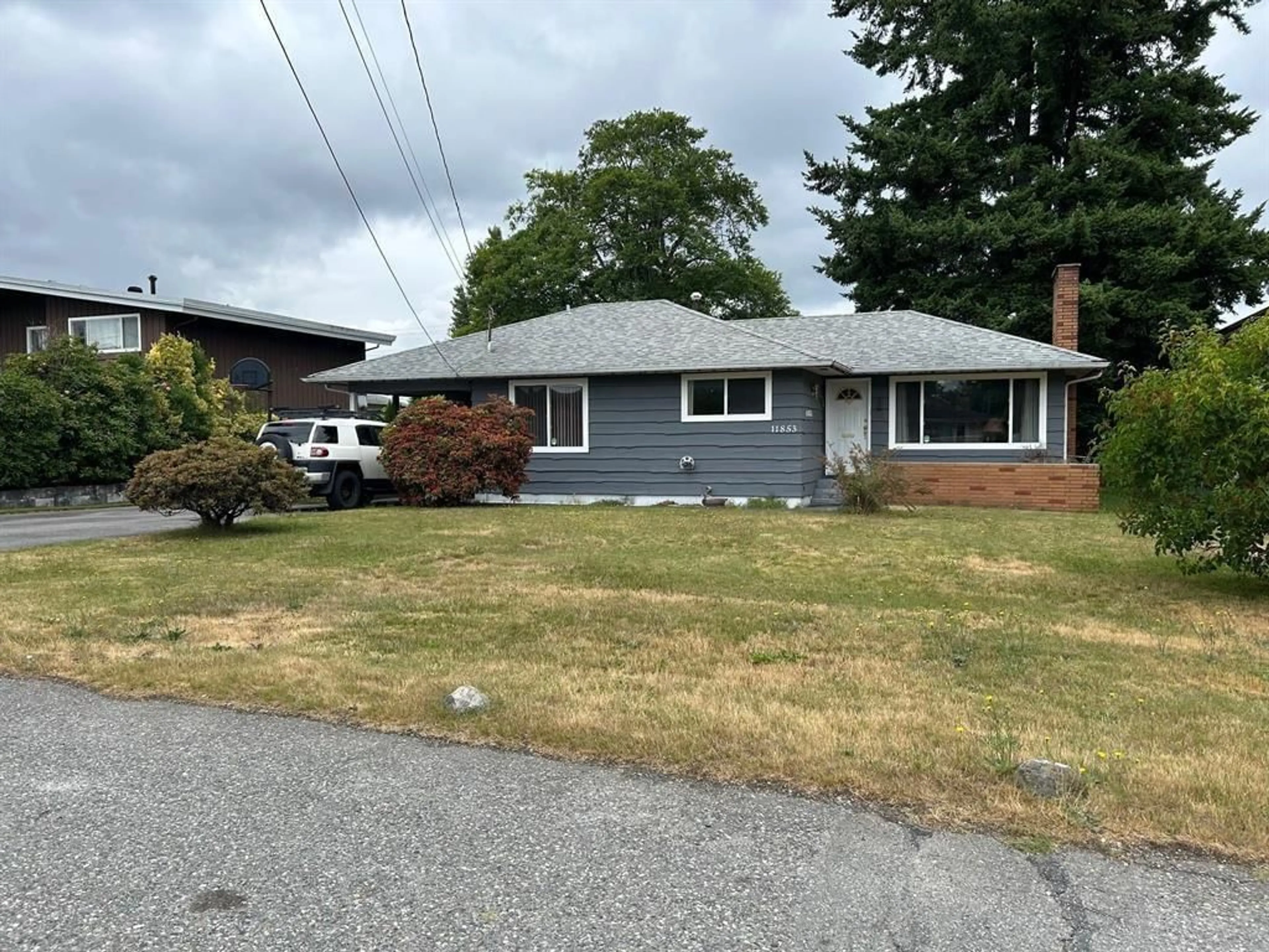 Frontside or backside of a home, the street view for 11853 86A AVENUE, Delta British Columbia V4C3A1