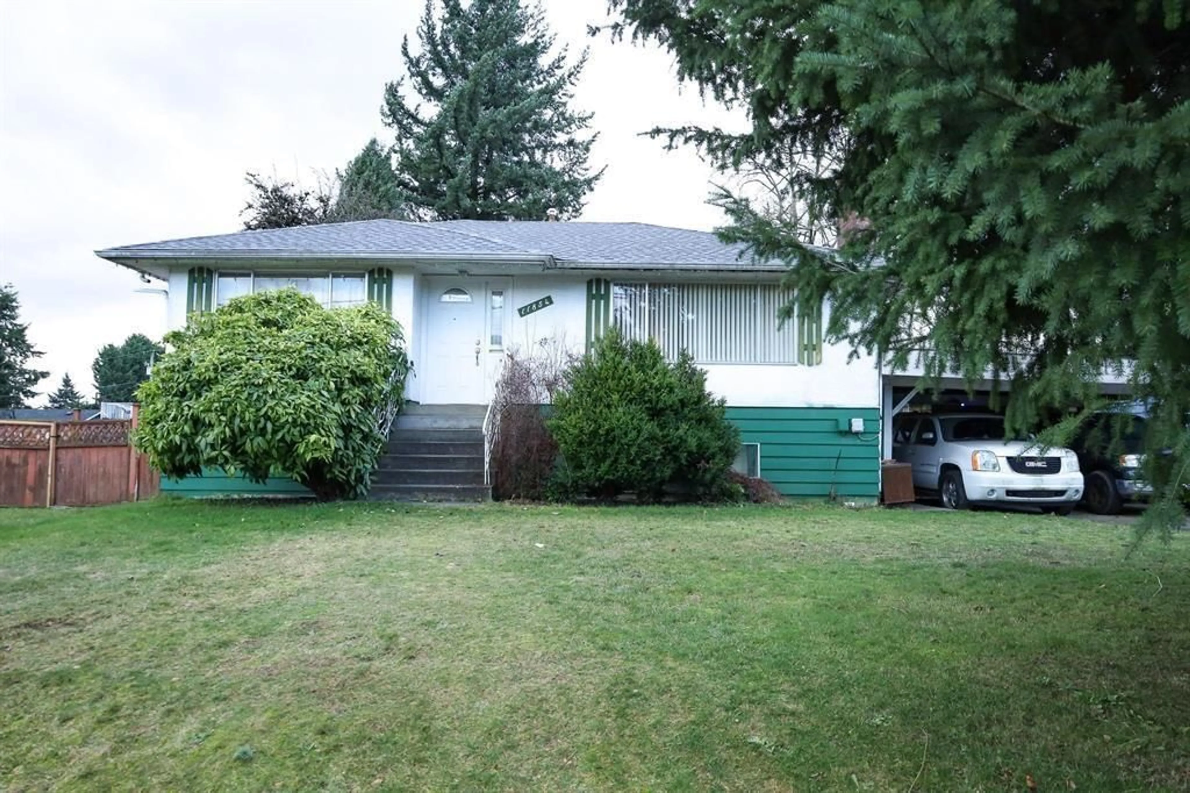 Home with vinyl exterior material, street for 11854 87, Delta British Columbia V4C3A1