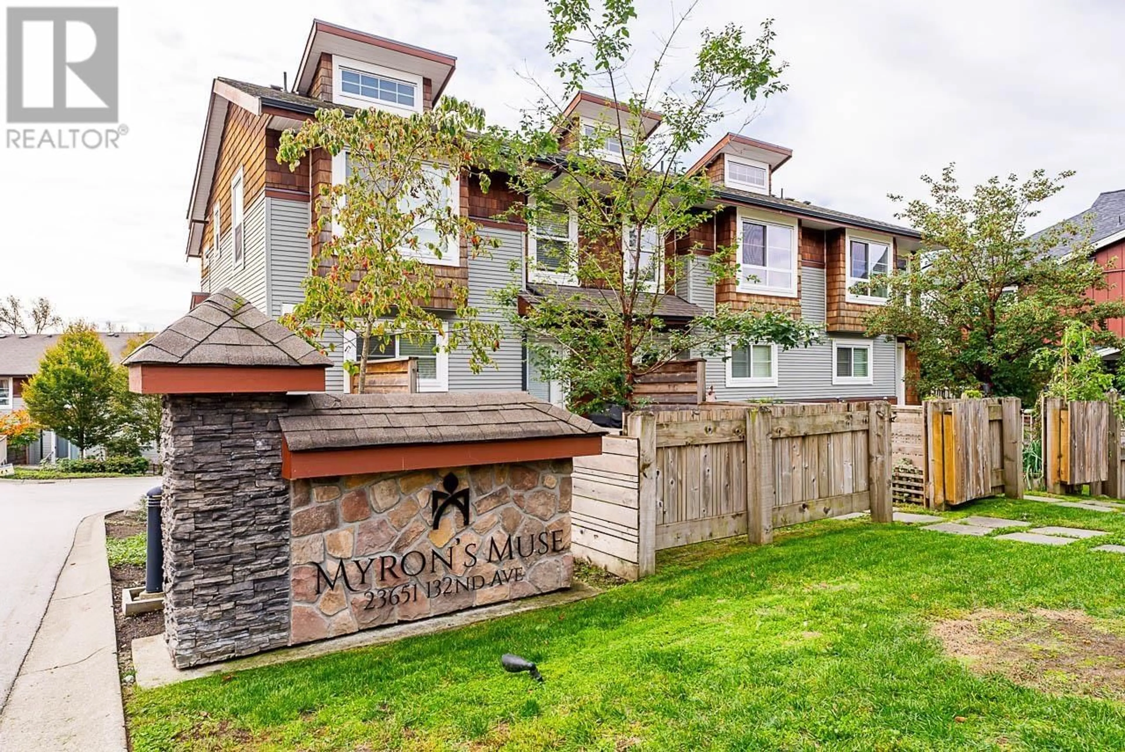 A pic from exterior of the house or condo, the fenced backyard for 39 23651 132 AVENUE, Maple Ridge British Columbia V4R0E9