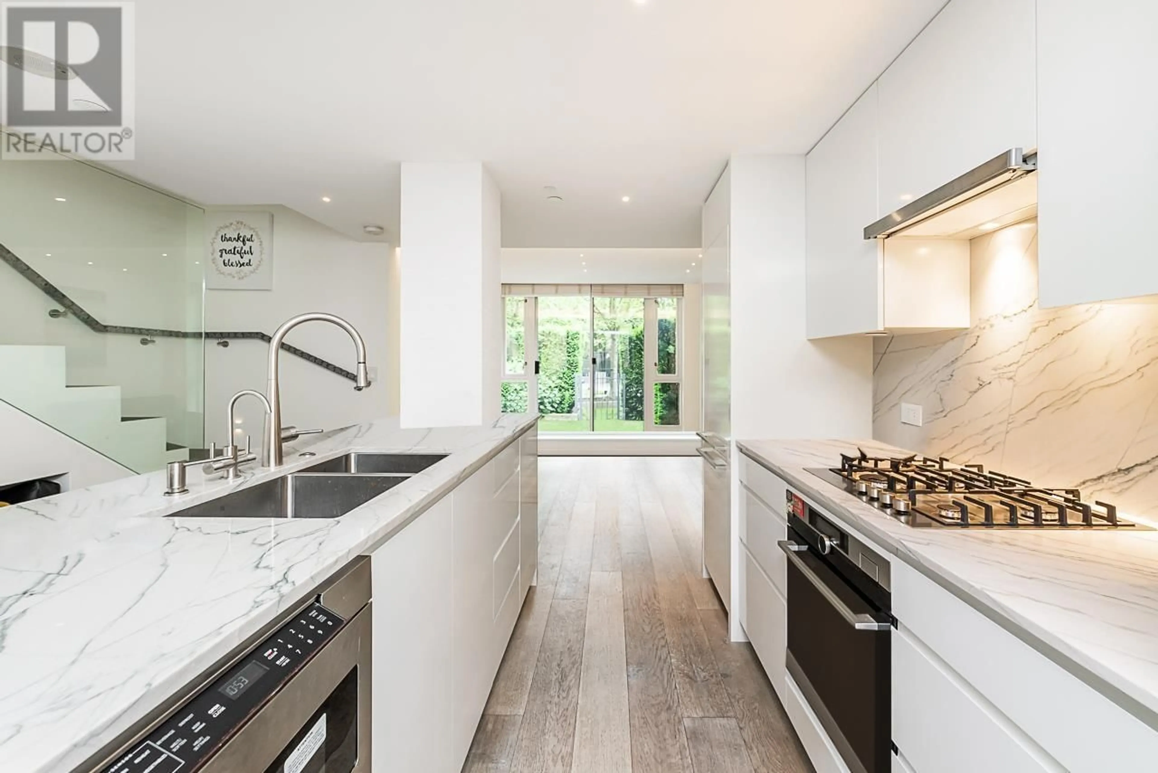 Contemporary kitchen, wood floors for 938 BEATTY STREET, Vancouver British Columbia V6Z3G6