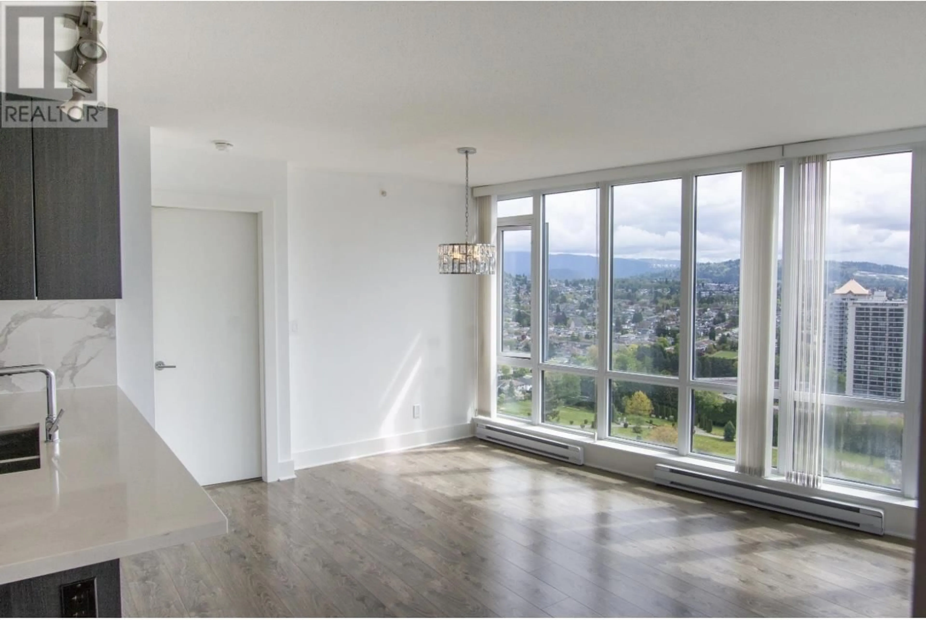 A pic of a room, wood floors for 3308 4189 HALIFAX STREET, Burnaby British Columbia V5C0H9