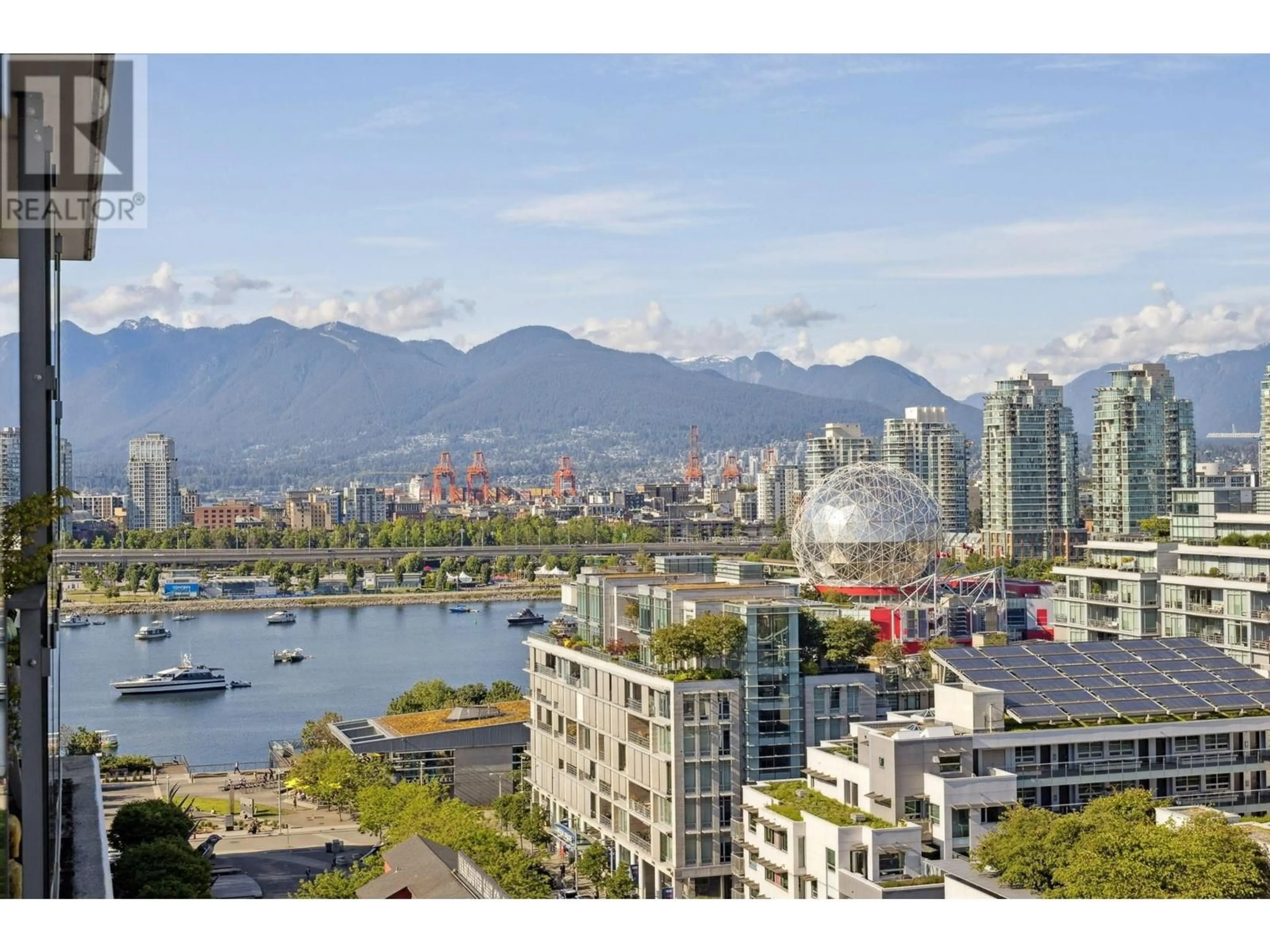 A pic from exterior of the house or condo, the view of city buildings for PH1705 1783 MANITOBA STREET, Vancouver British Columbia V5Y0K1