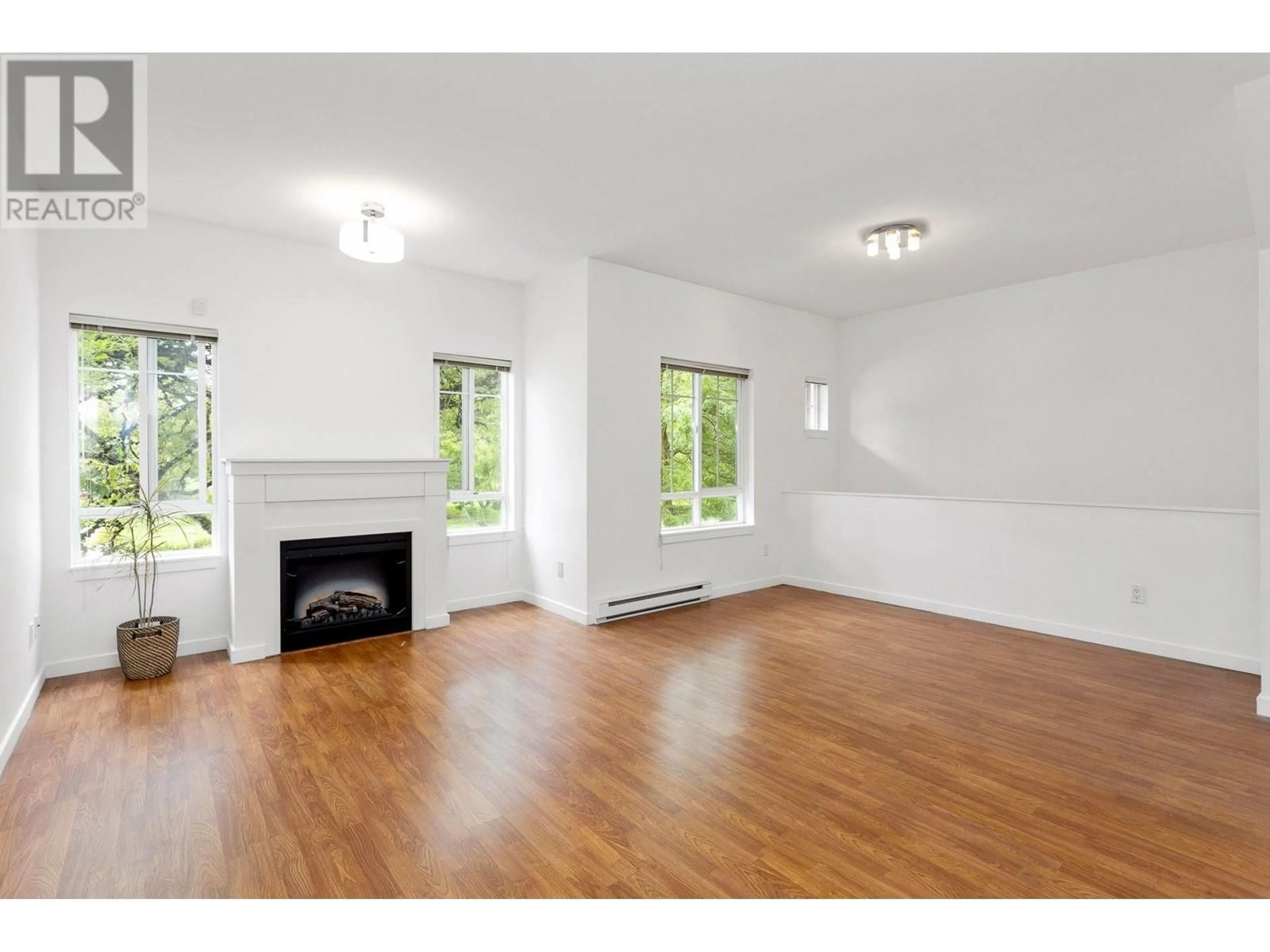 A pic of a room, wood floors for 7 9020 DIXON AVENUE, Richmond British Columbia V6Y1E4