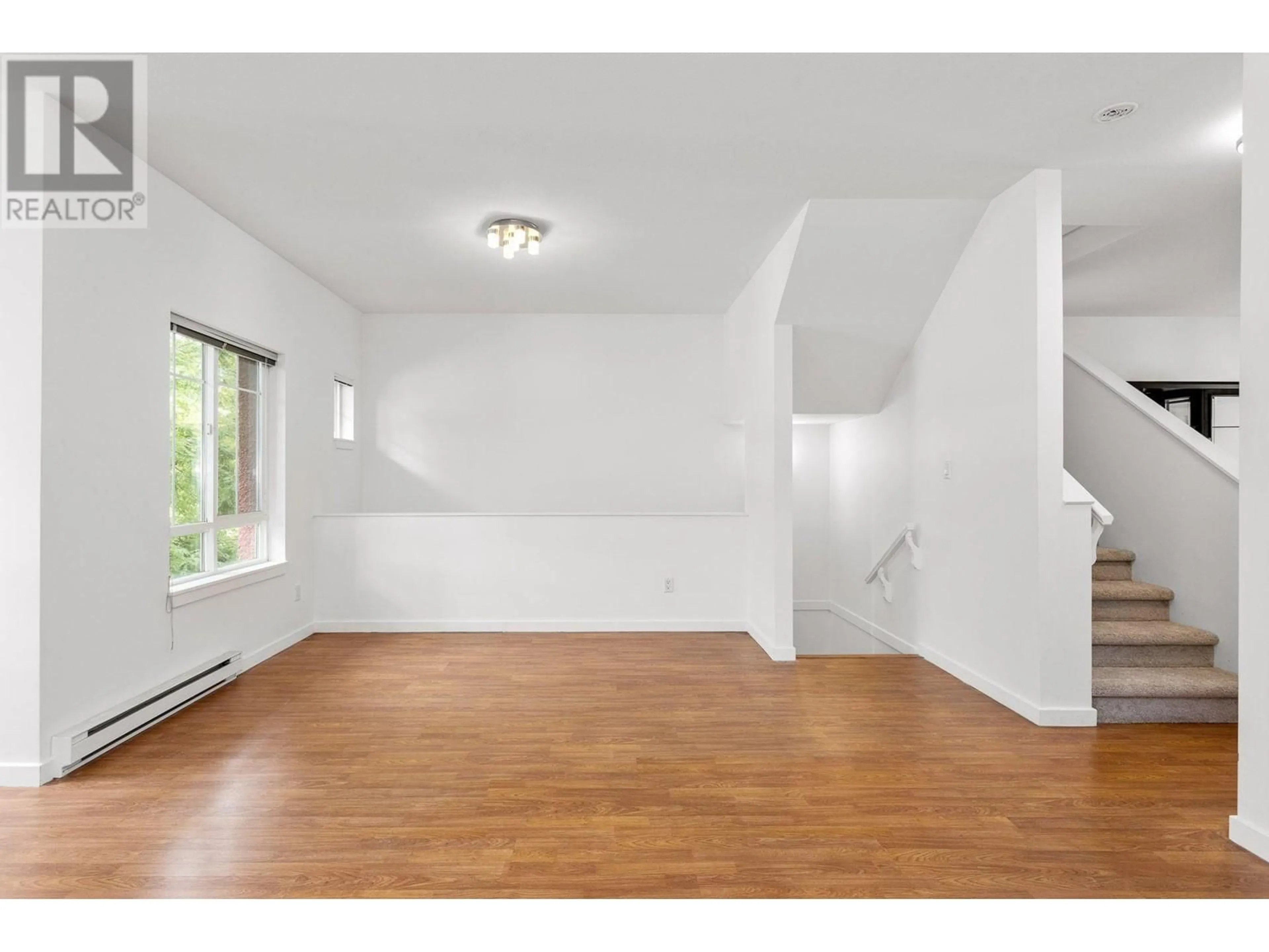 A pic of a room, wood floors for 7 9020 DIXON AVENUE, Richmond British Columbia V6Y1E4