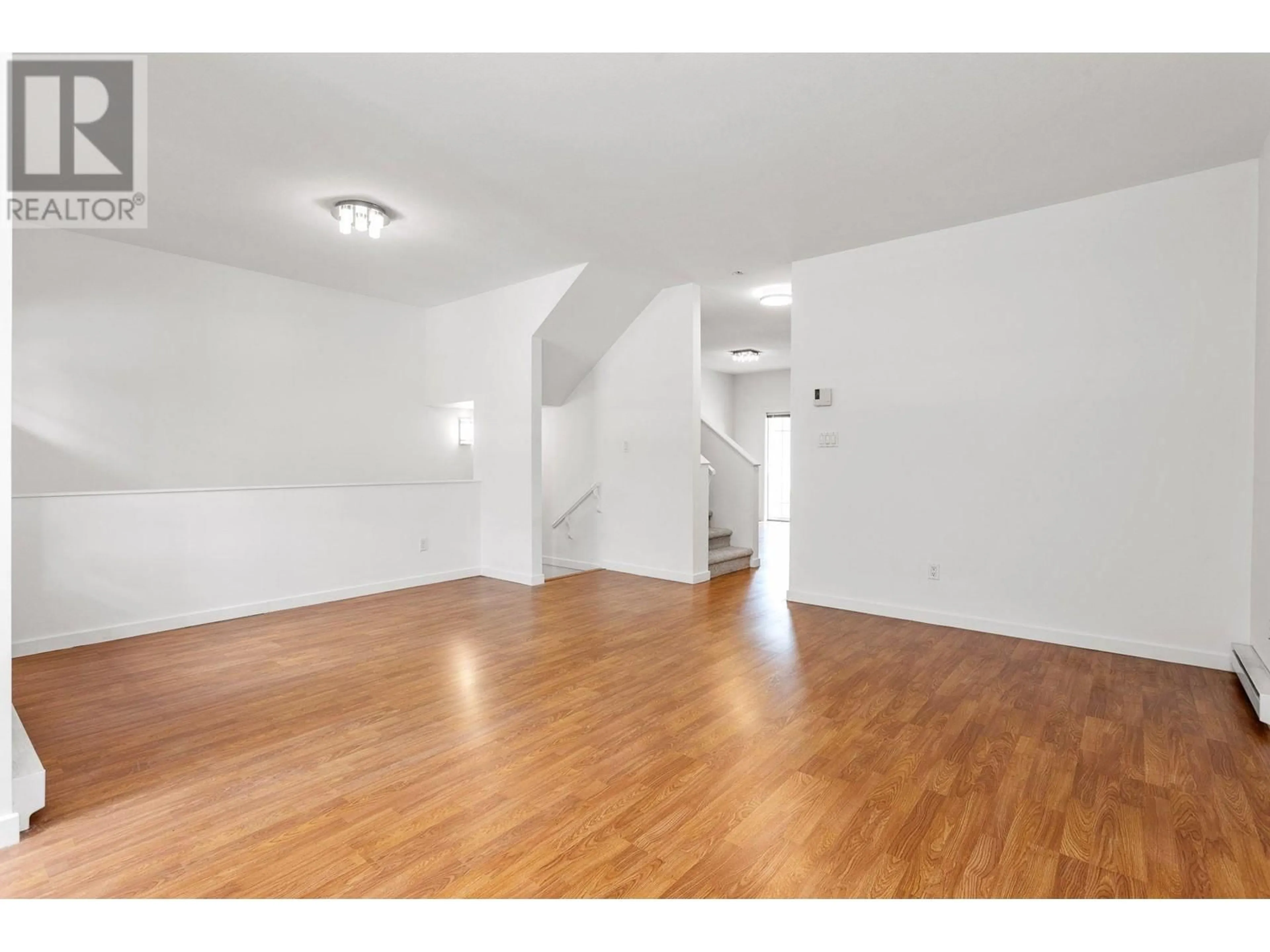 A pic of a room, wood floors for 7 9020 DIXON AVENUE, Richmond British Columbia V6Y1E4