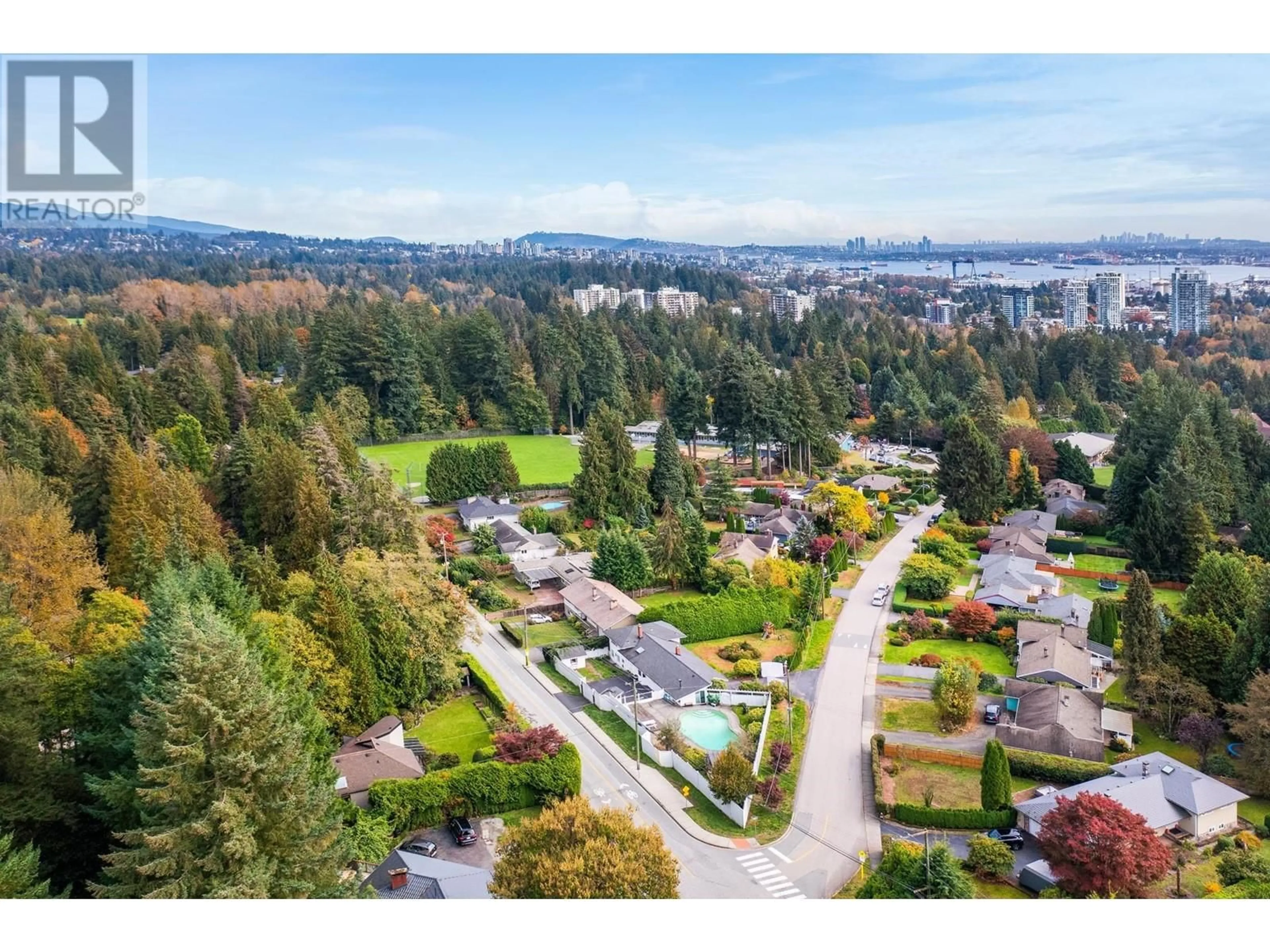 A pic from exterior of the house or condo, the fenced backyard for 695 BURLEY DRIVE, West Vancouver British Columbia V7T1Z3