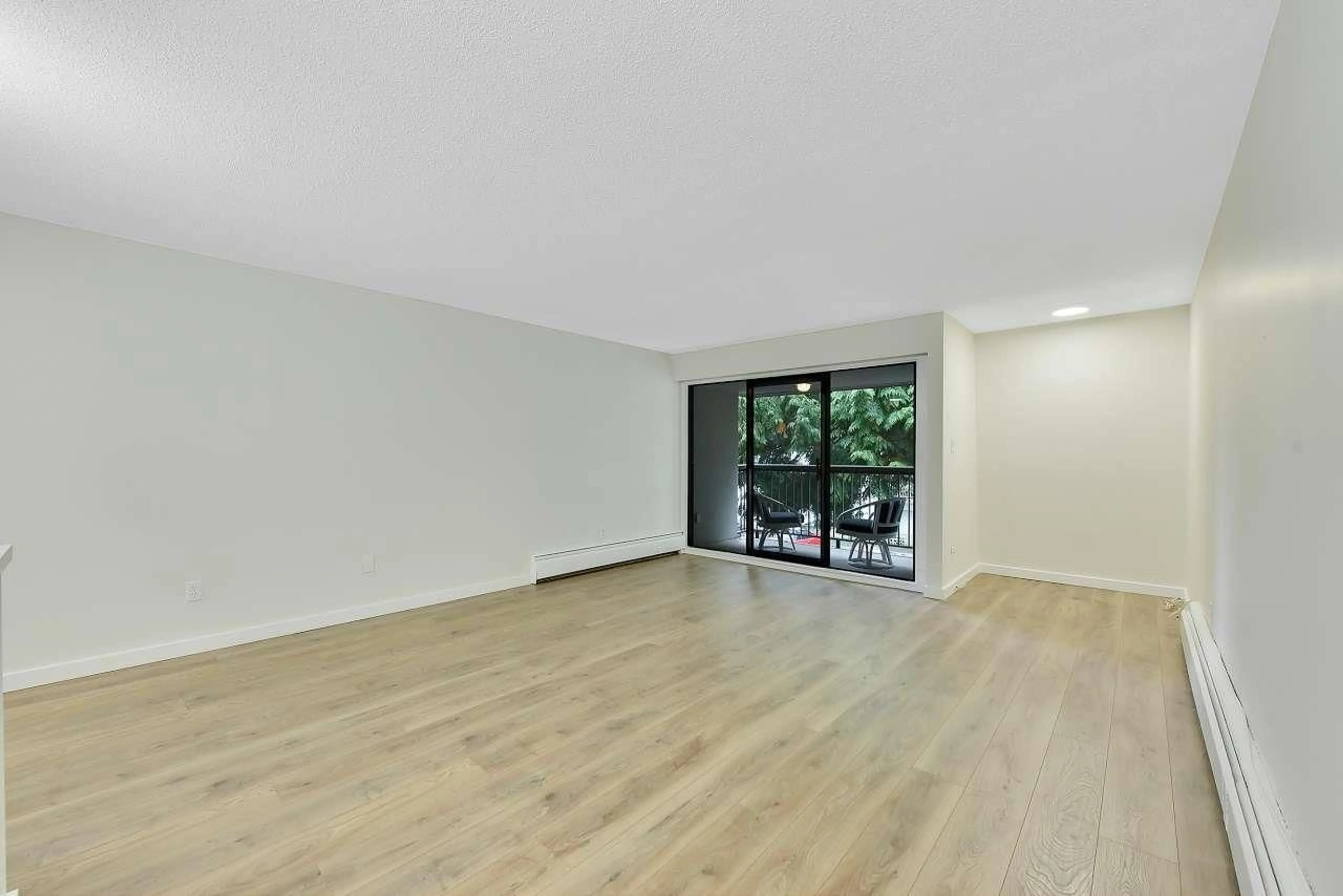 A pic of a room, wood floors for 203 1355 FIR STREET, White Rock British Columbia V4B4B3