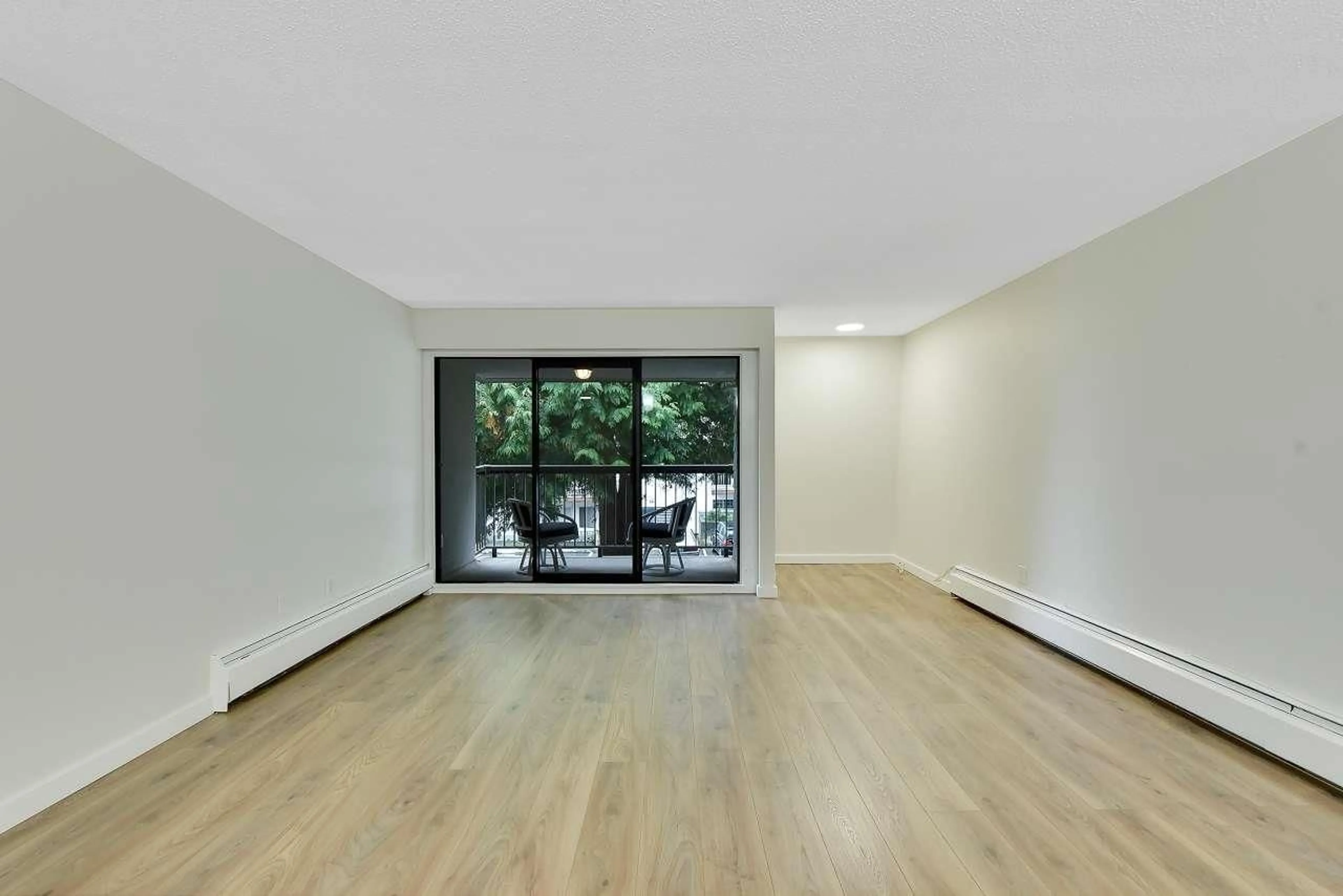 A pic of a room, wood floors for 203 1355 FIR STREET, White Rock British Columbia V4B4B3