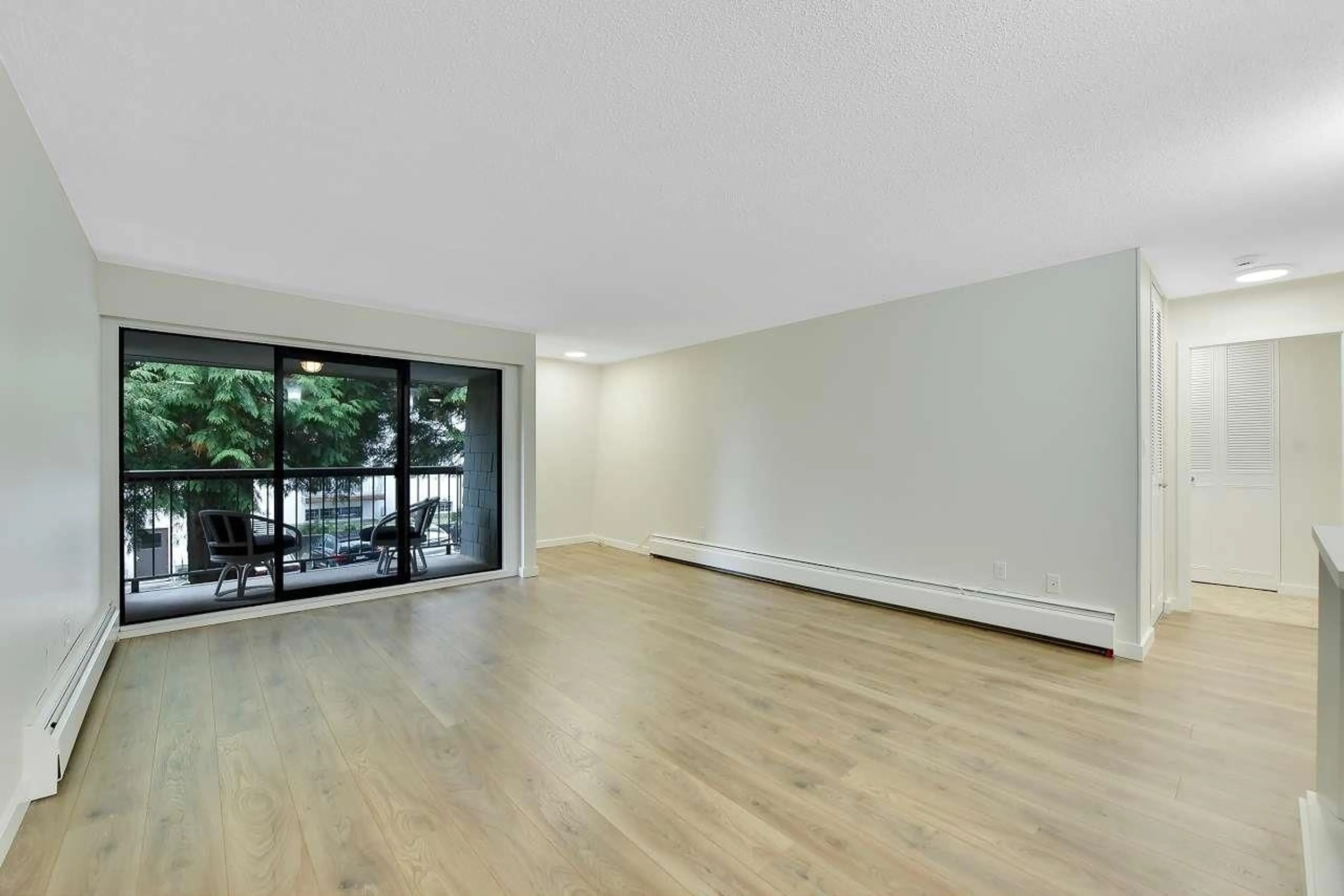 A pic of a room, wood floors for 203 1355 FIR STREET, White Rock British Columbia V4B4B3