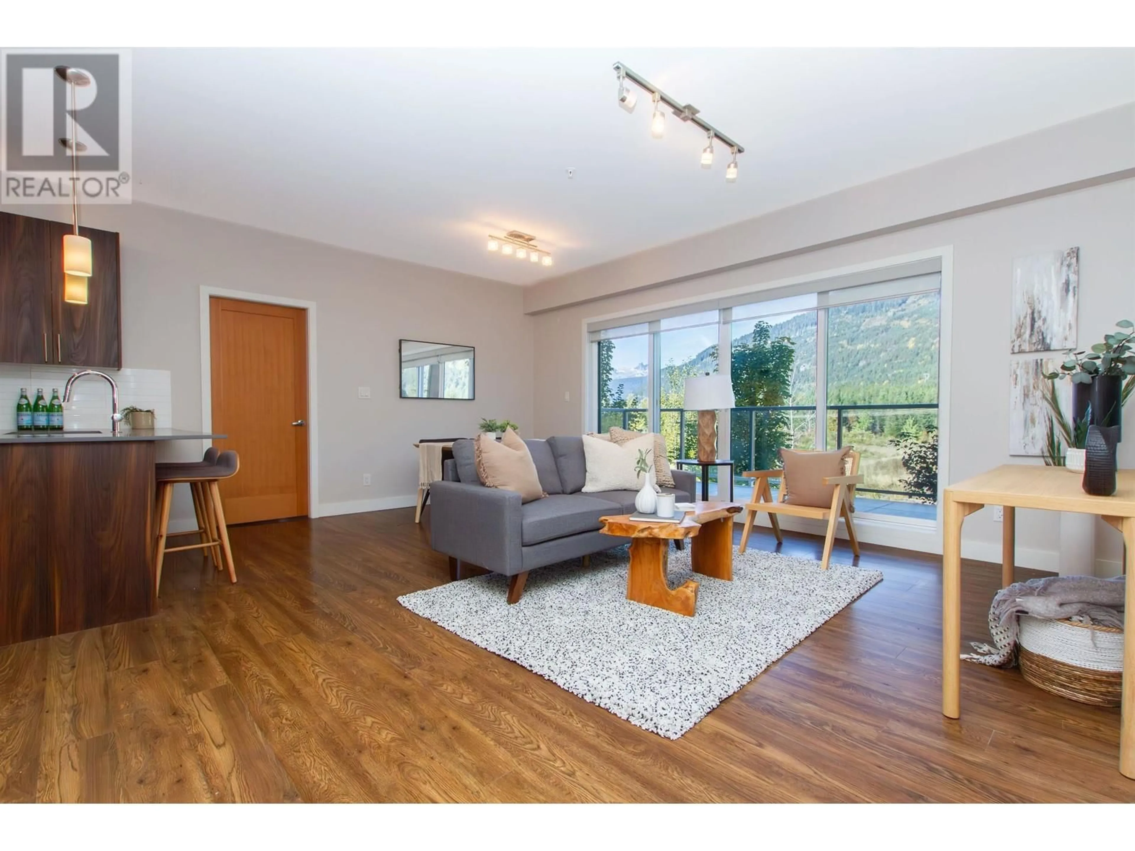 Living room, wood floors for 205 1025 LEGACY WAY, Whistler British Columbia V8E0S2