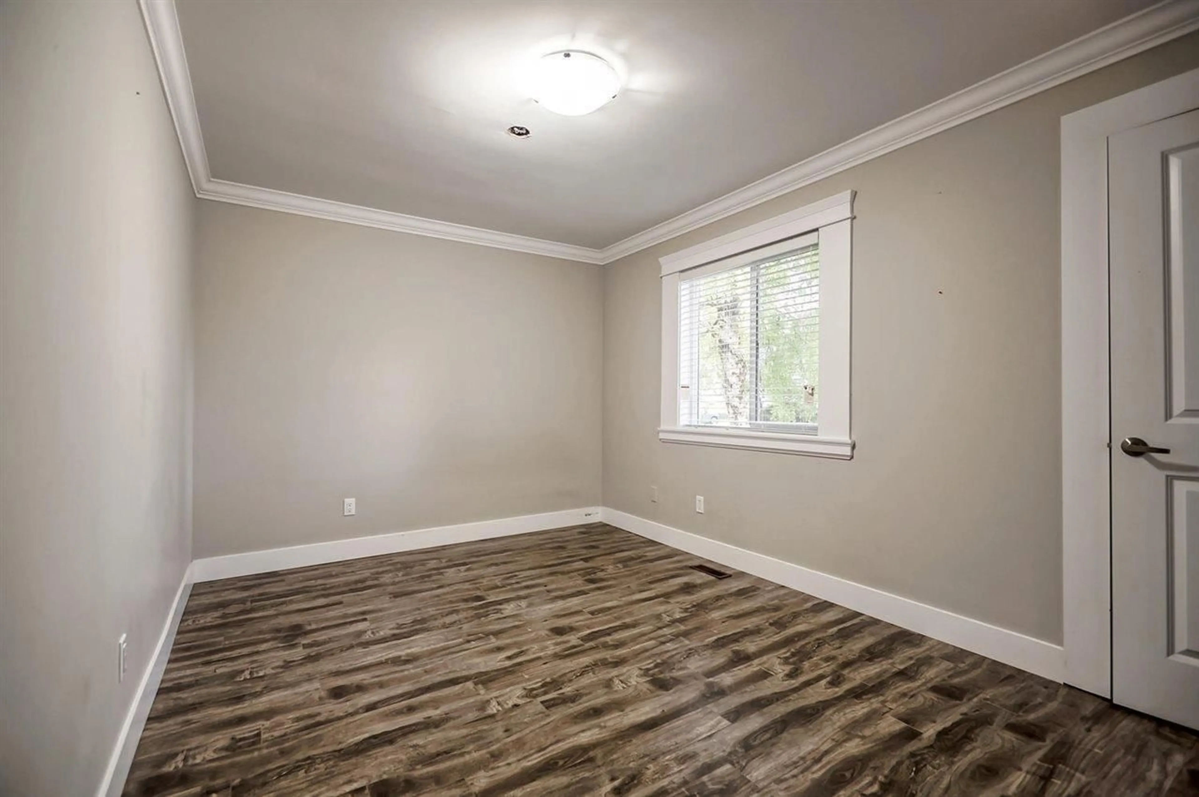 A pic of a room, wood floors for 12609 98 AVENUE, Surrey British Columbia V3W2Y7