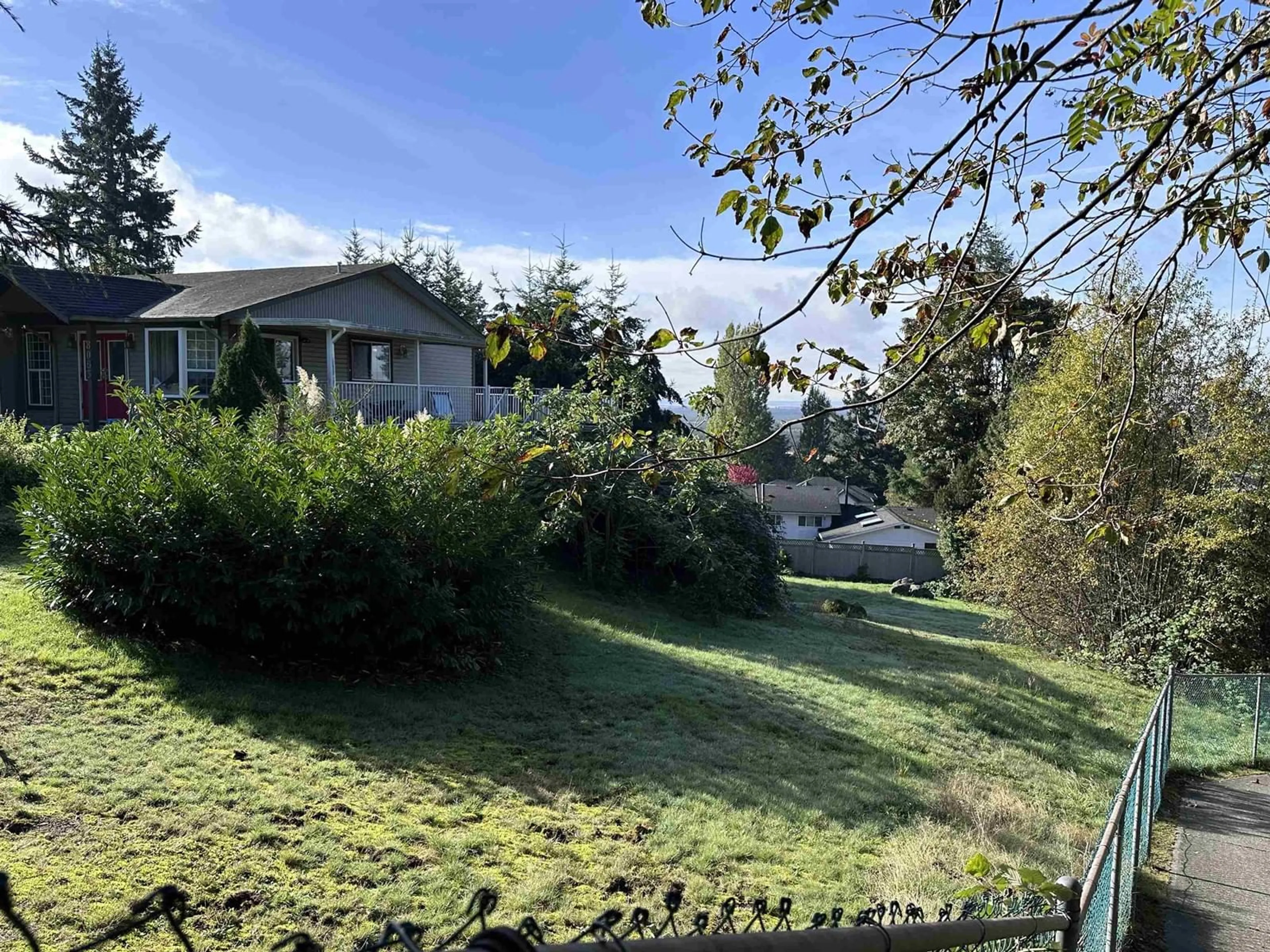 Frontside or backside of a home, the fenced backyard for 8063 WILTSHIRE BOULEVARD, Delta British Columbia V4C4B5