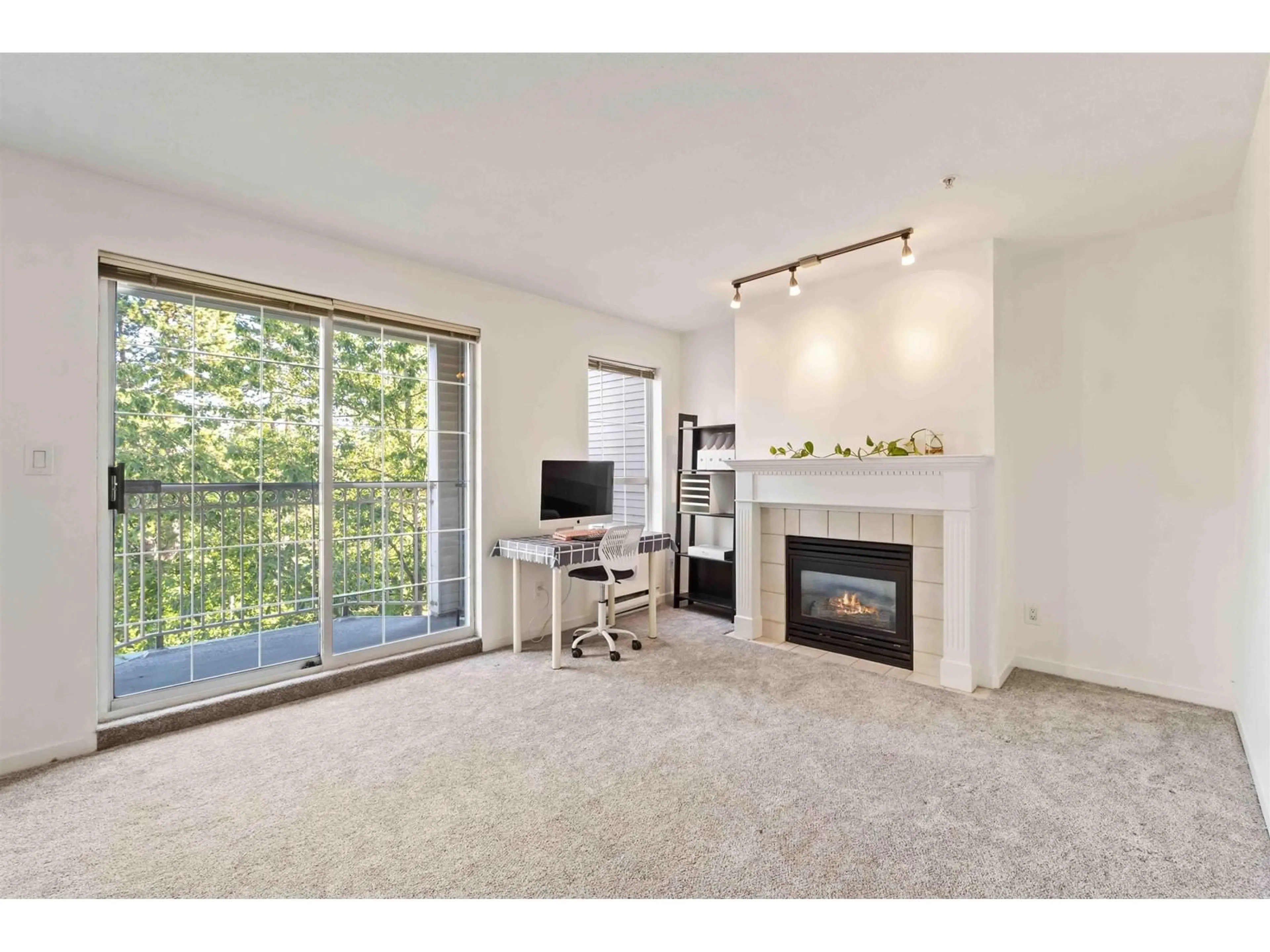 A pic of a room, carpet floors for 304 15258 105 AVENUE, Surrey British Columbia V3R0W8